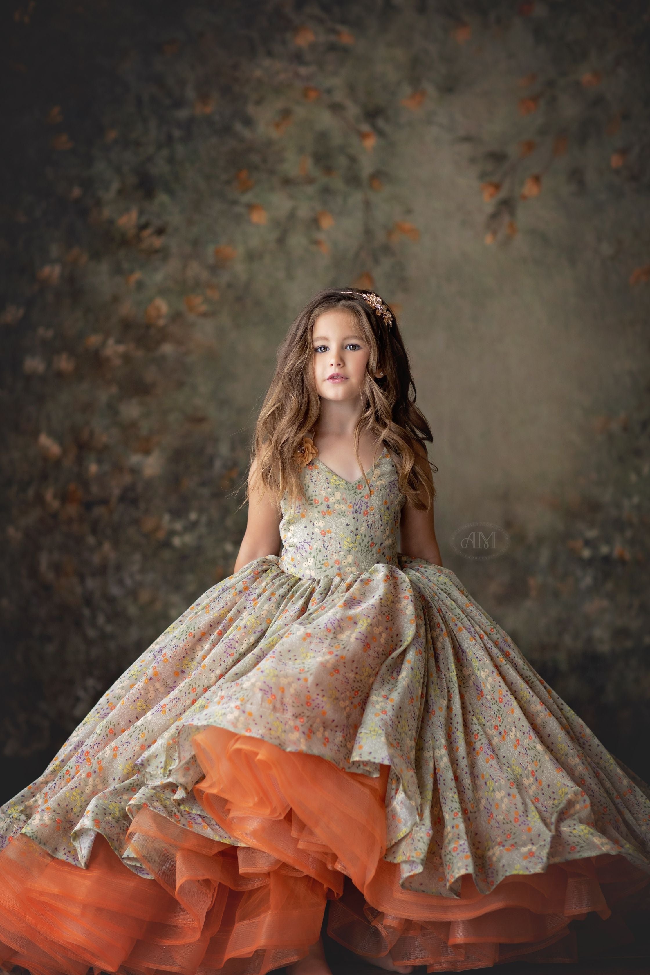 Elegant high low gowns with flowing skirts and luxurious fabrics, perfect for photography sessions and special occasions.