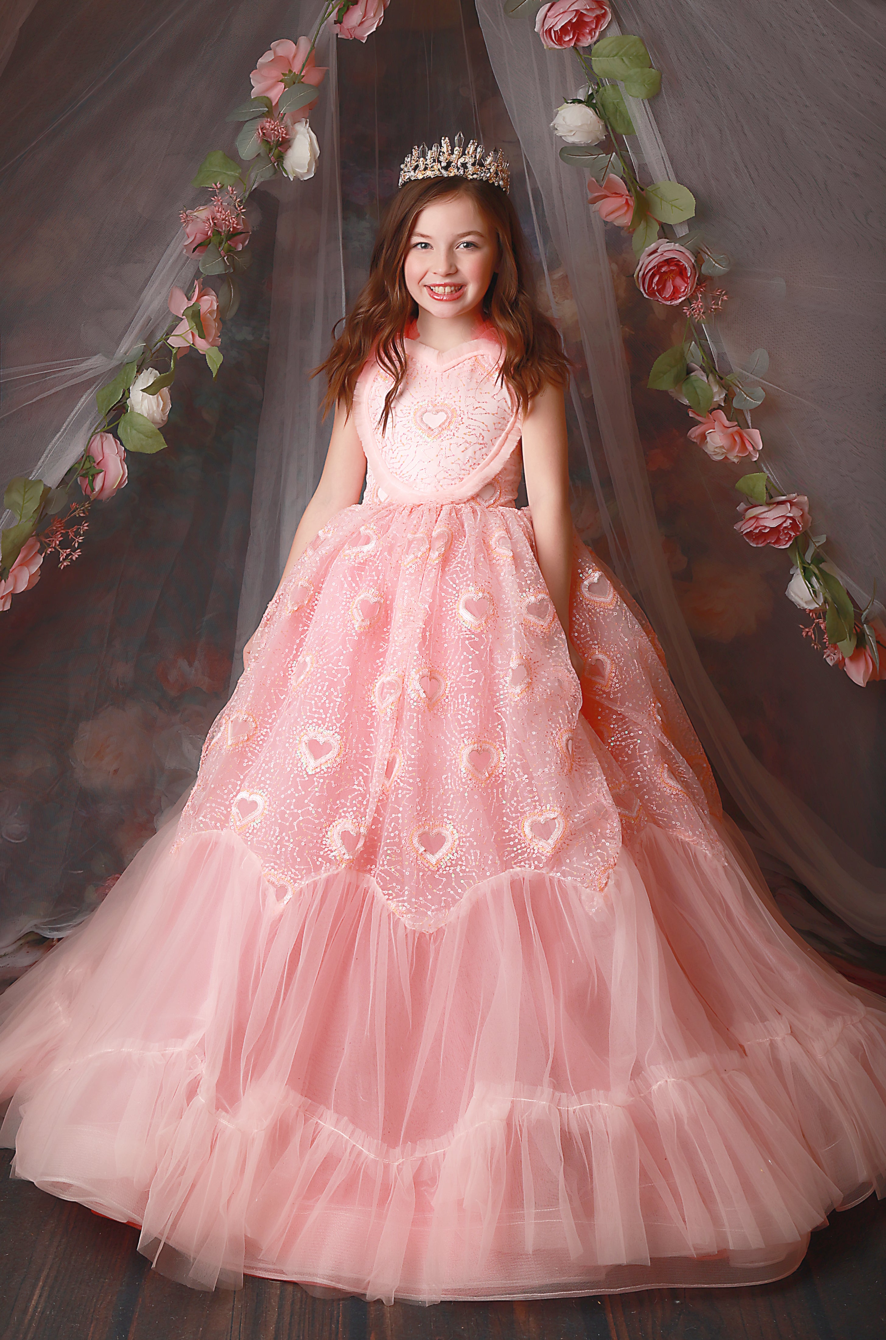 Discover a world of style and sophistication for your little princess in our couture gown collection.