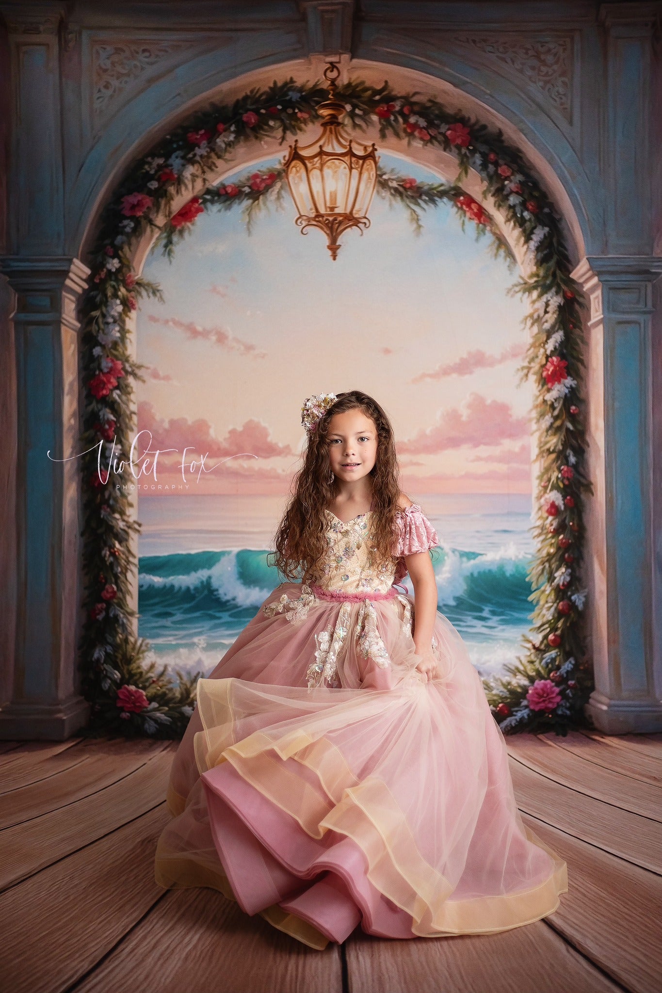 girl wearing a couture gown for holiday portrait