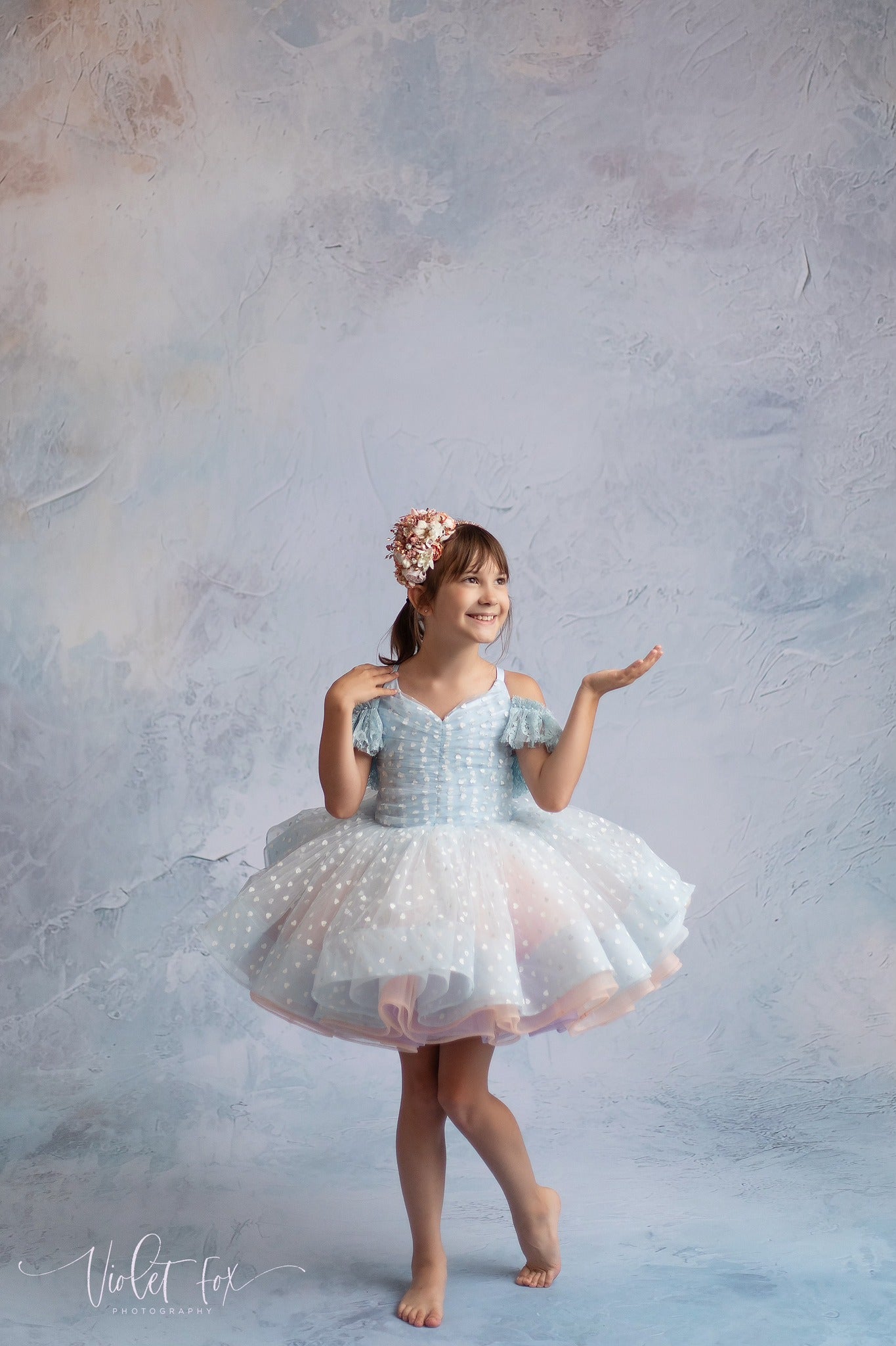 Girl wearing a dress with hearts