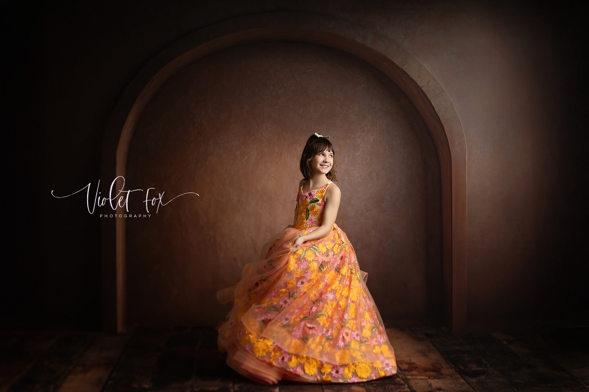 "Young girl in a luxurious satin gown with a flowing skirt, wearing a delicate lace overlay and a soft, elegant neckline."