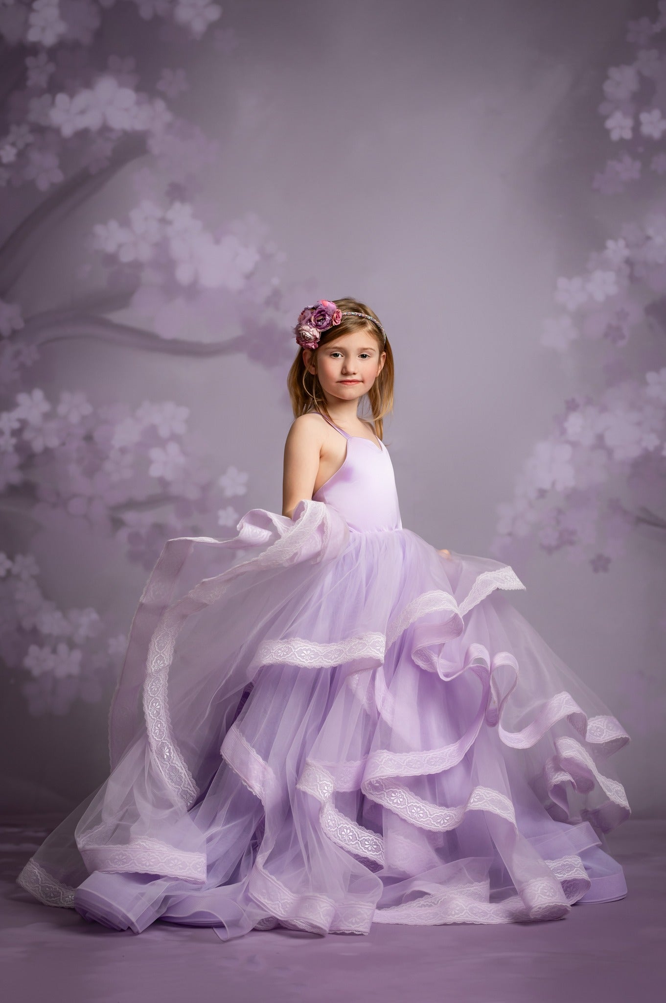 Handcrafted Cascade gown available in multiple colors for your dream event.
