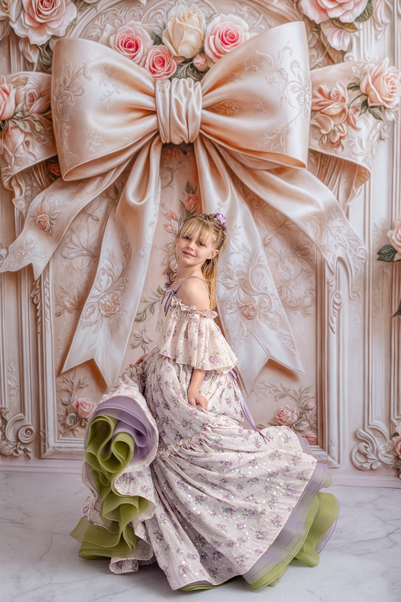 "A stunning floor-length Whispering Serenade gown draped in delicate fabric, perfect for an elegant photoshoot."