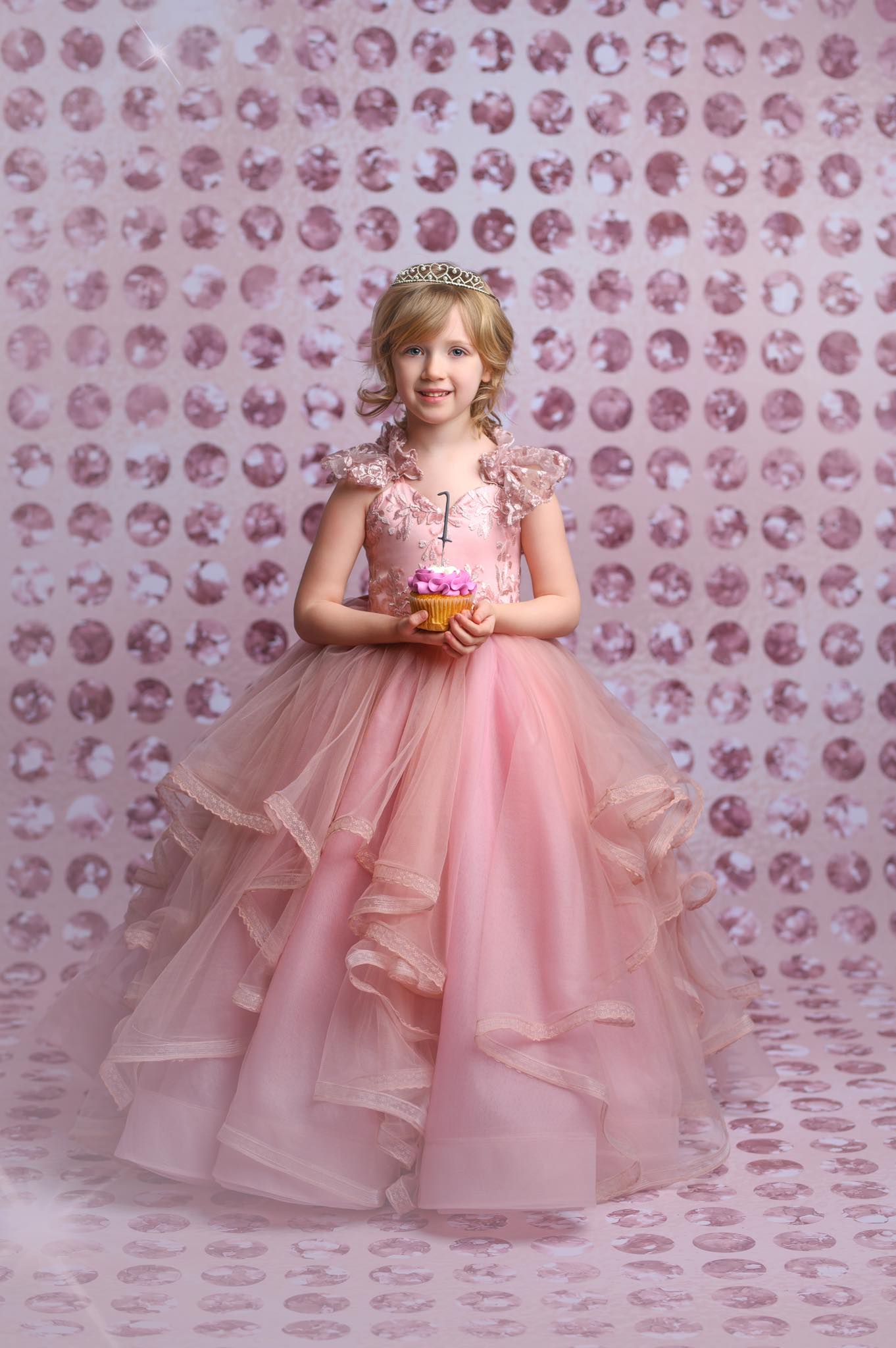 "Full tulle skirt of the Rosy Reverie gown flowing gracefully, capturing the movement and spirit of your toddler."