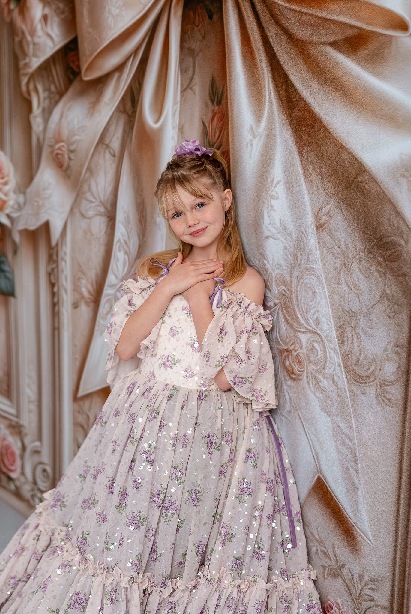 "Soft, ethereal layers of the Whispering Serenade gown create a timeless and sophisticated silhouette."