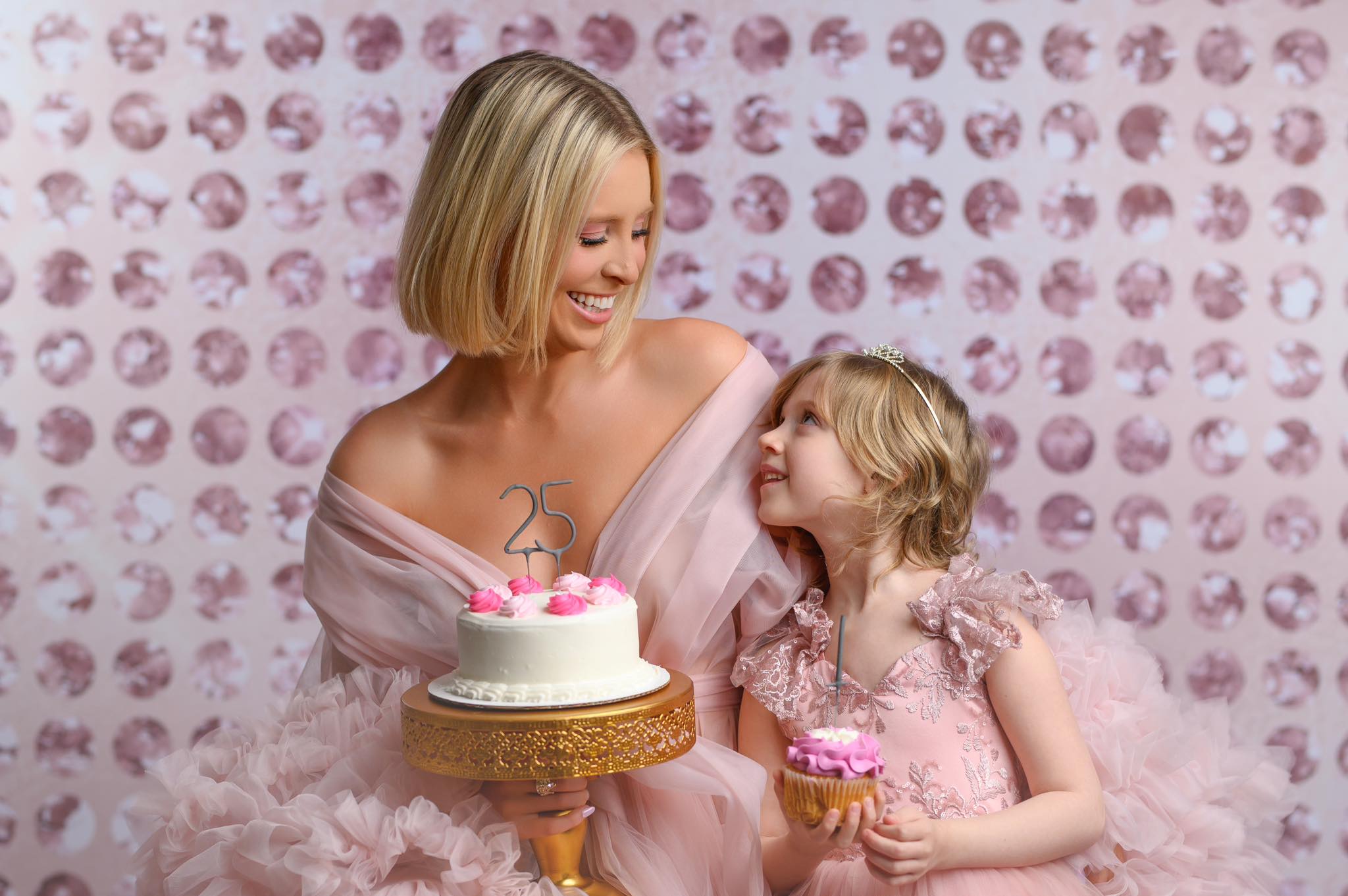 "Side view of the Rosy Reverie gown highlighting the beautiful on-shoulder ruffled detail, adding whimsy and charm."