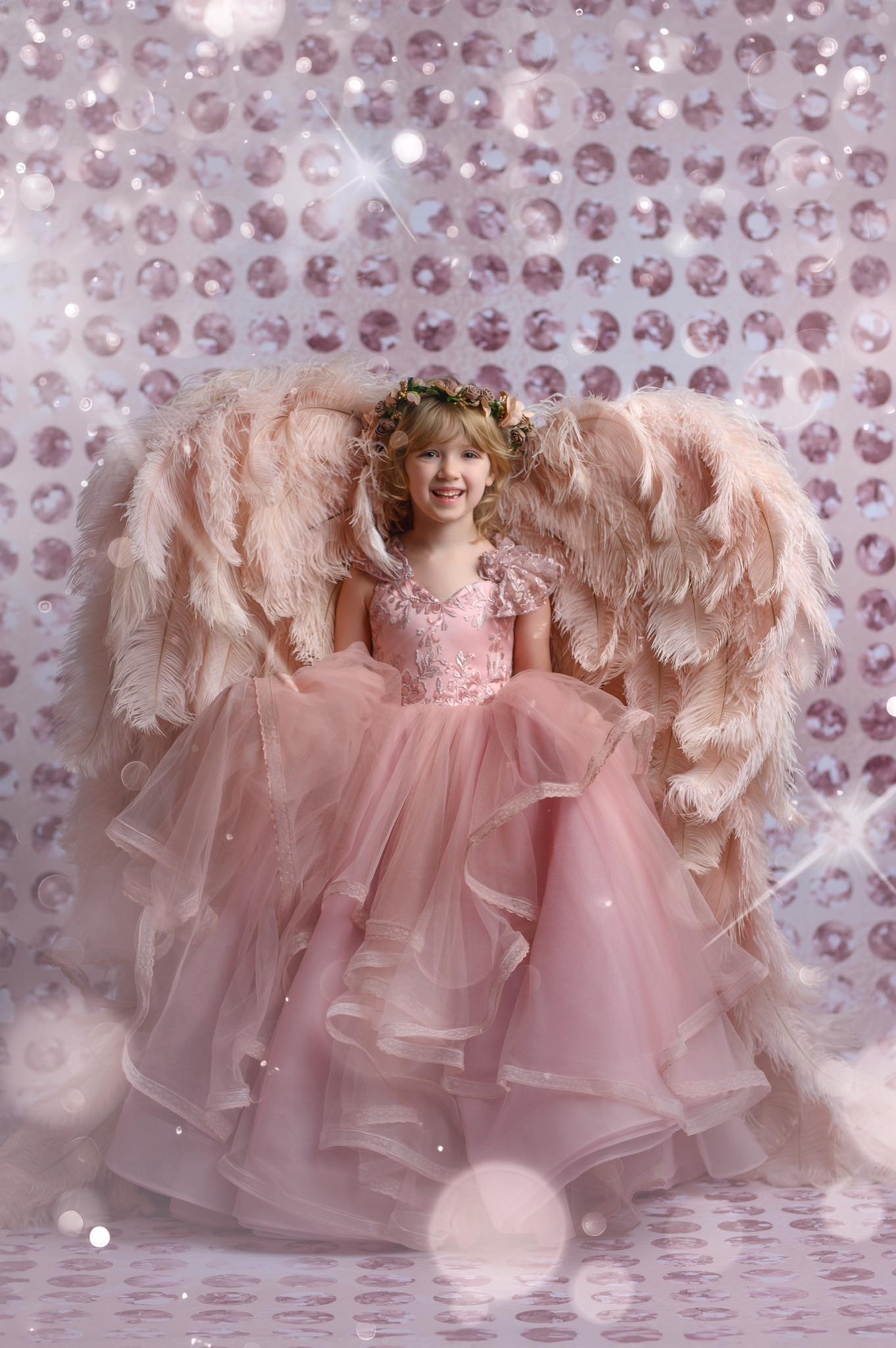"Full view of the Rosy Reverie toddler gown in blush, showcasing the sequin embroidered bodice and cascading tulle skirt."