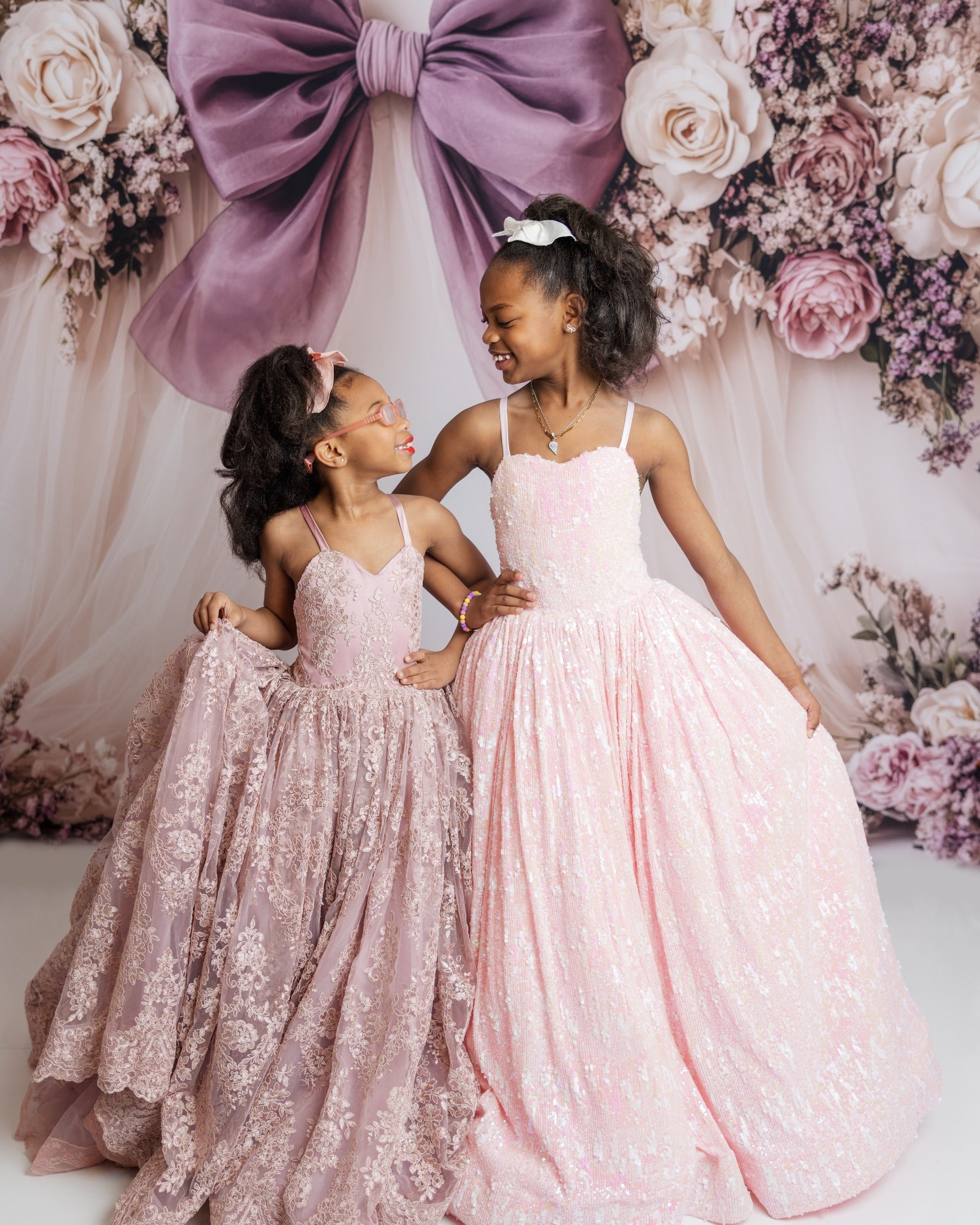 Dream dress moment captured during a sister session.