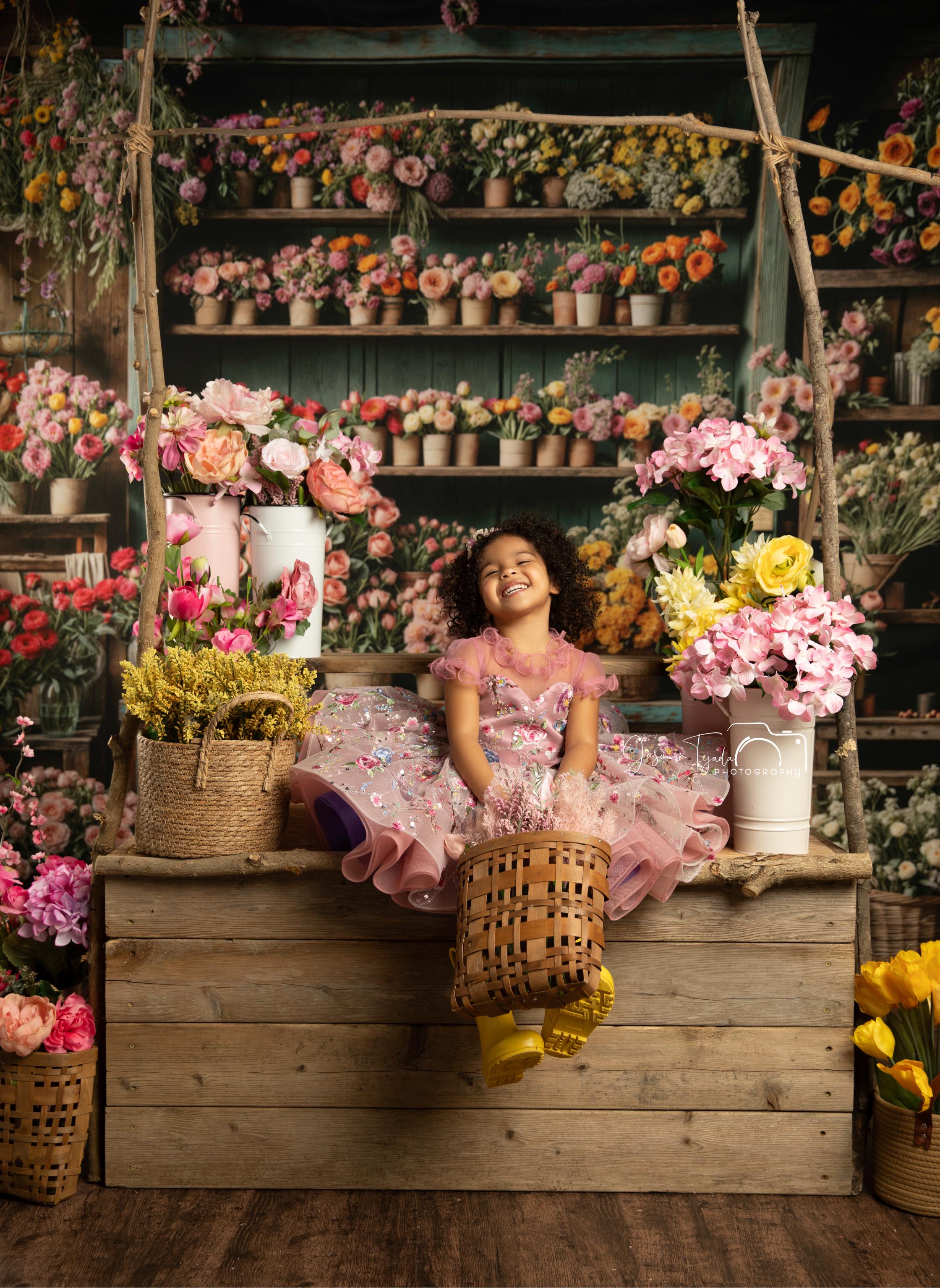 Soft layers of tulle and vibrant floral embroidery bring this gown to life in a fairytale design.
