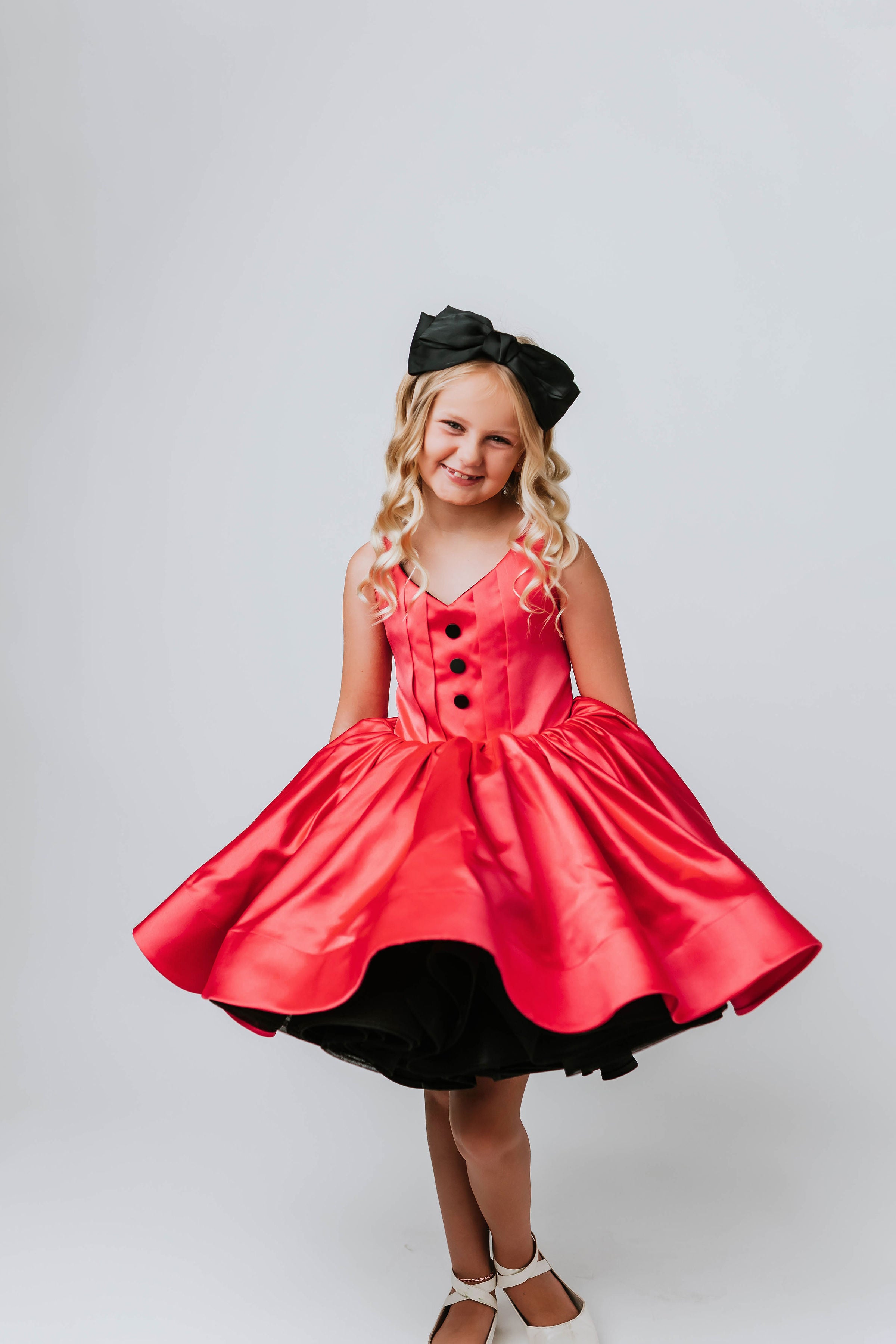 two dresses in One RETIRED RENTAL NEW CONDITION Reversible "Dolly" Pink/black  Petal  Length Dress ( 7 year- 8 year)
