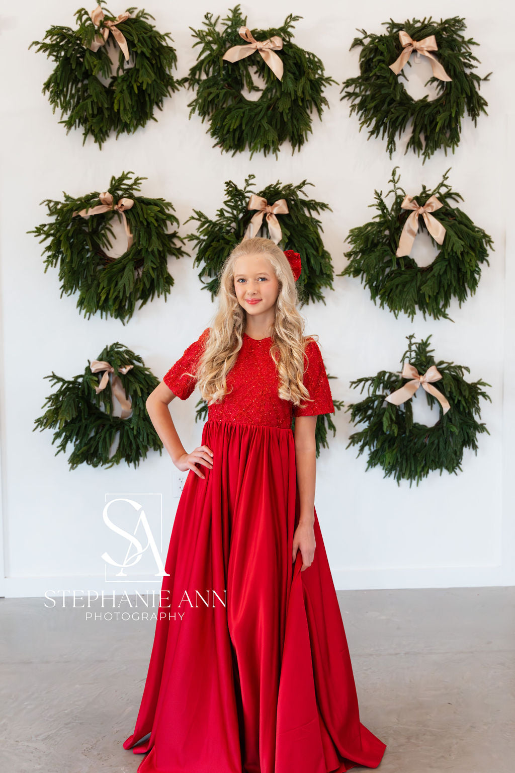 Twirling motion shot showing the gown’s fluid silk satin skirt