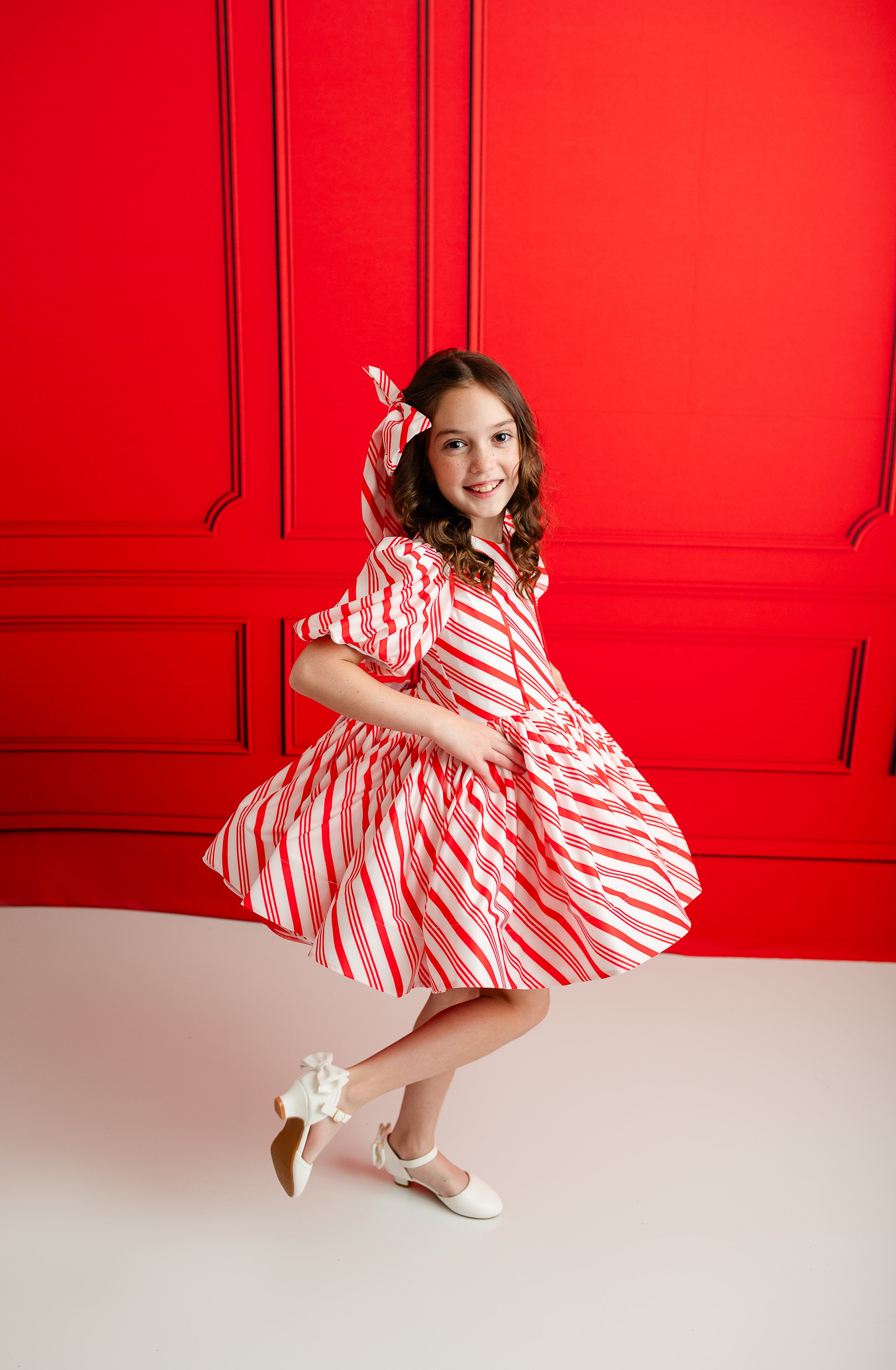 girl wearing custom peppermint themed dress