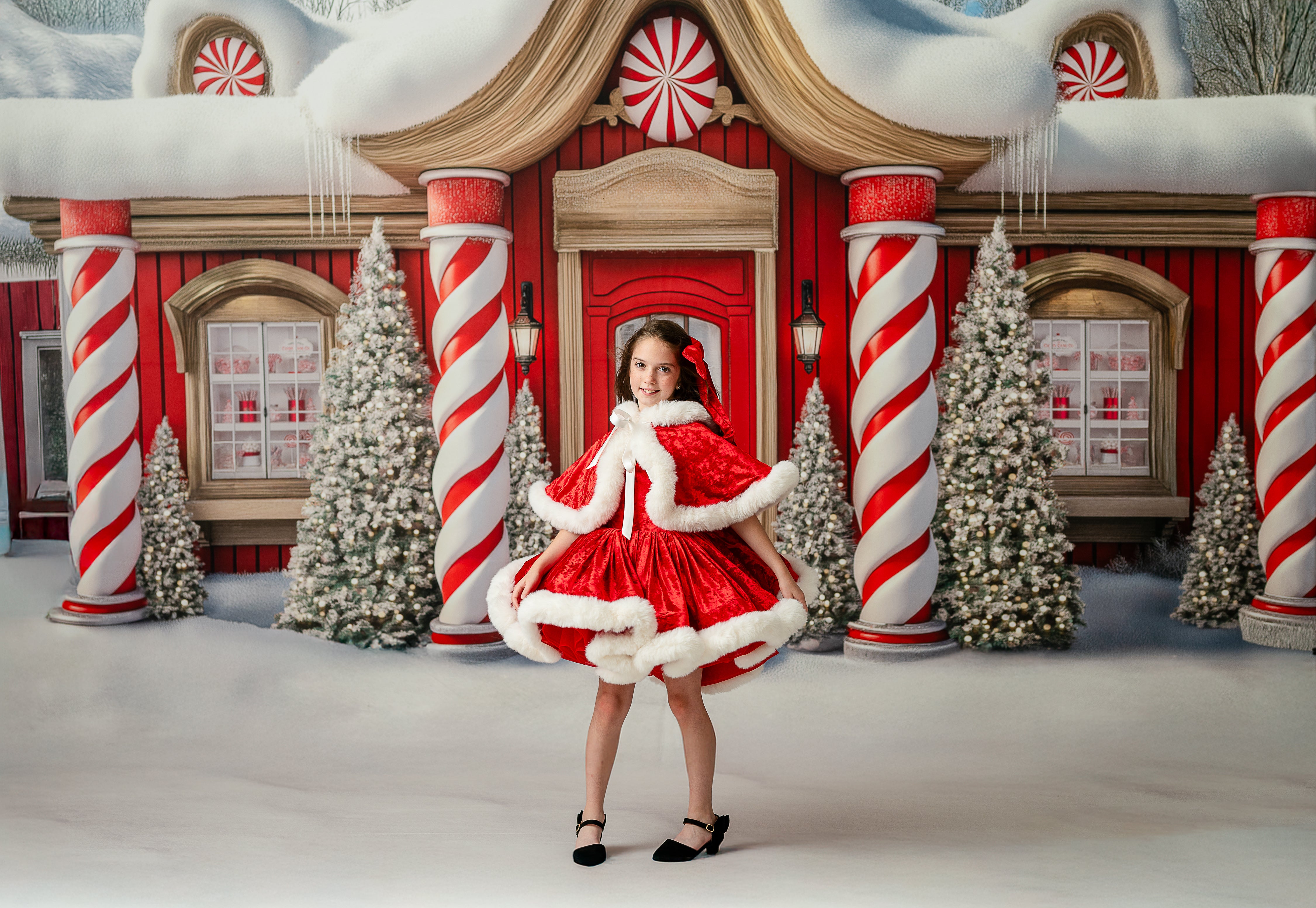 Girl posing in complete holiday set: dress, cape, and accessories
