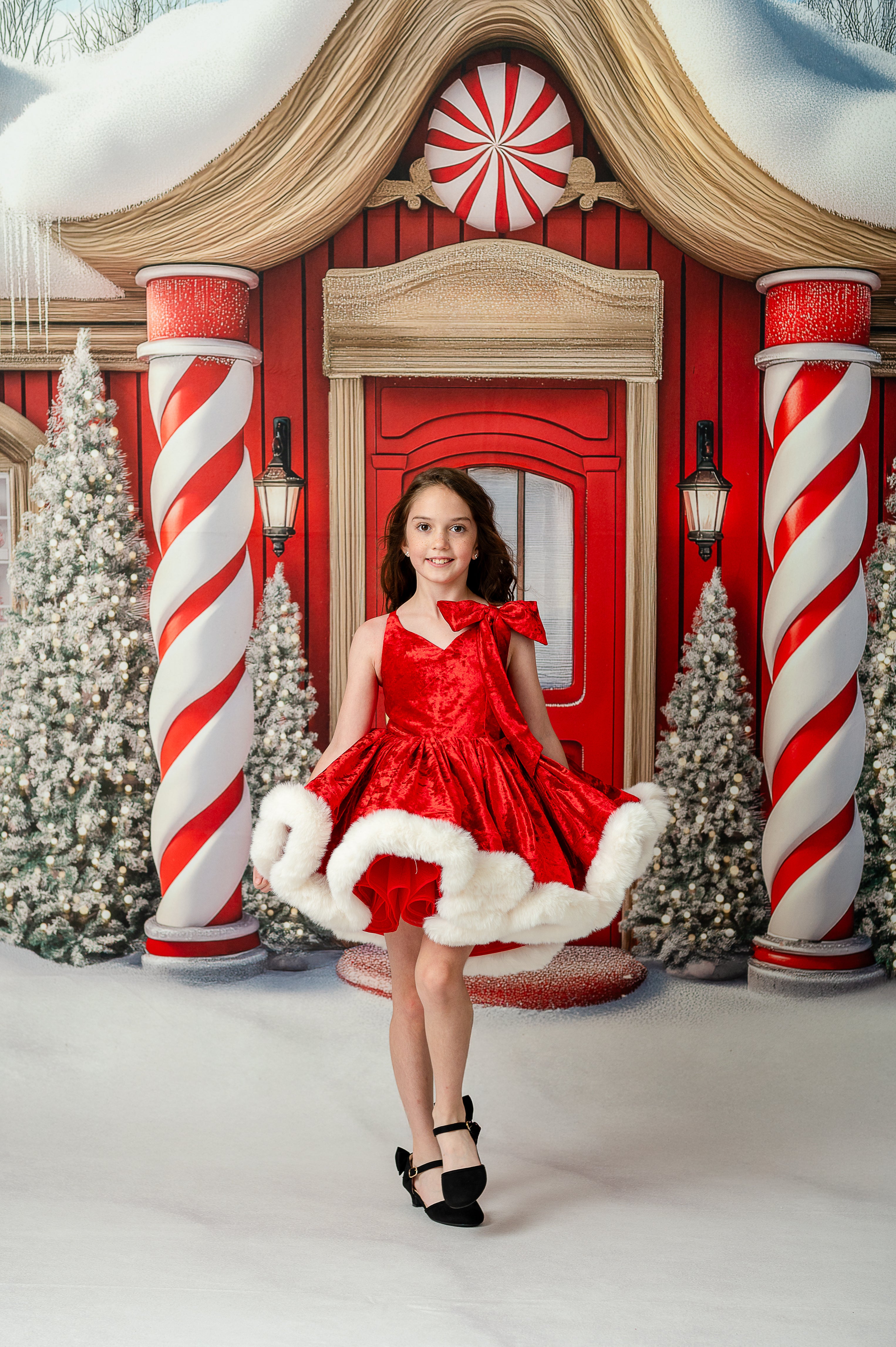 Styled holiday photo shoot featuring Mrs. Claus dress set for ages 5–7