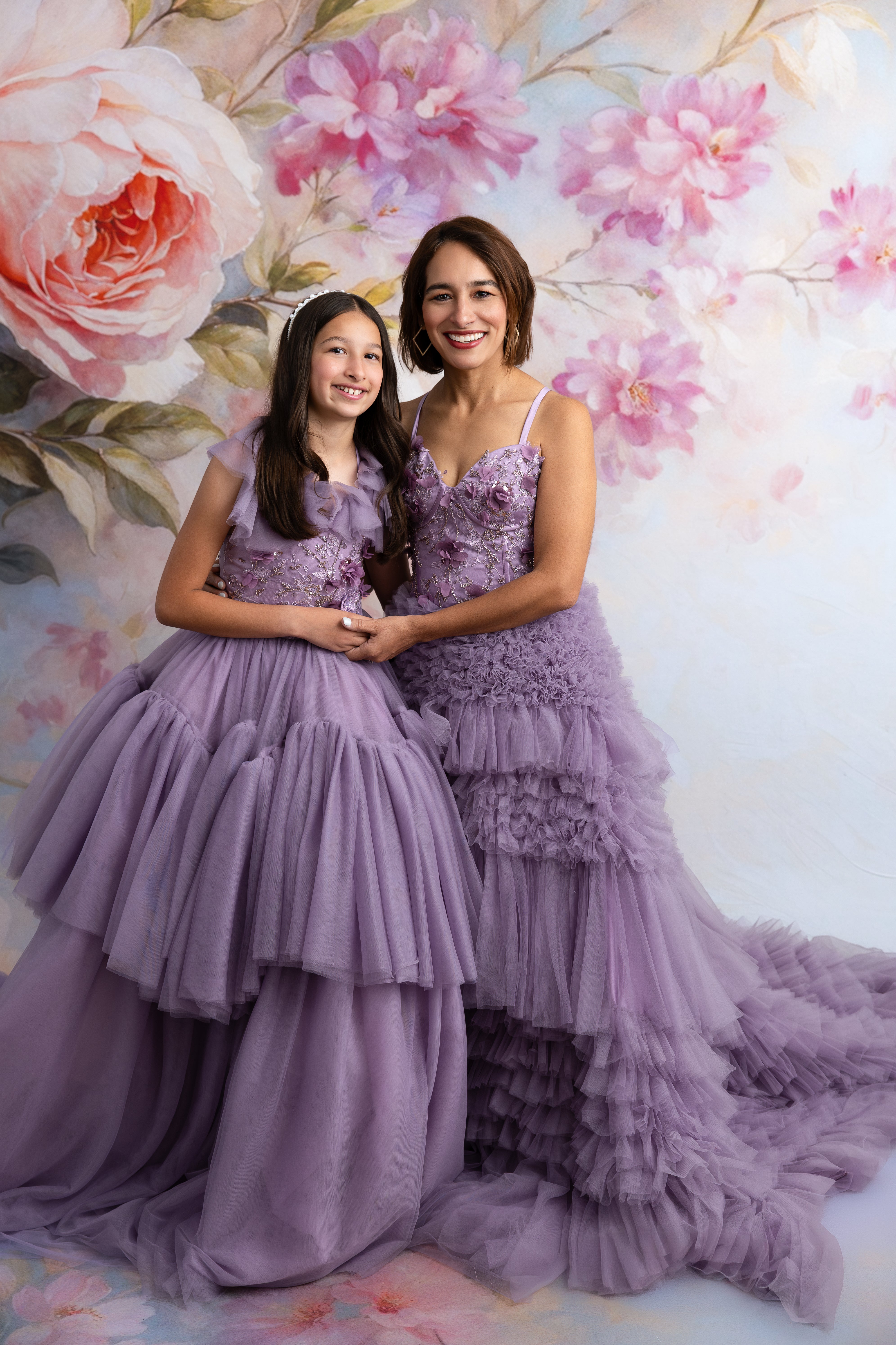 Floor-length Violet Grace gown shown in whimsical, enchanted setting