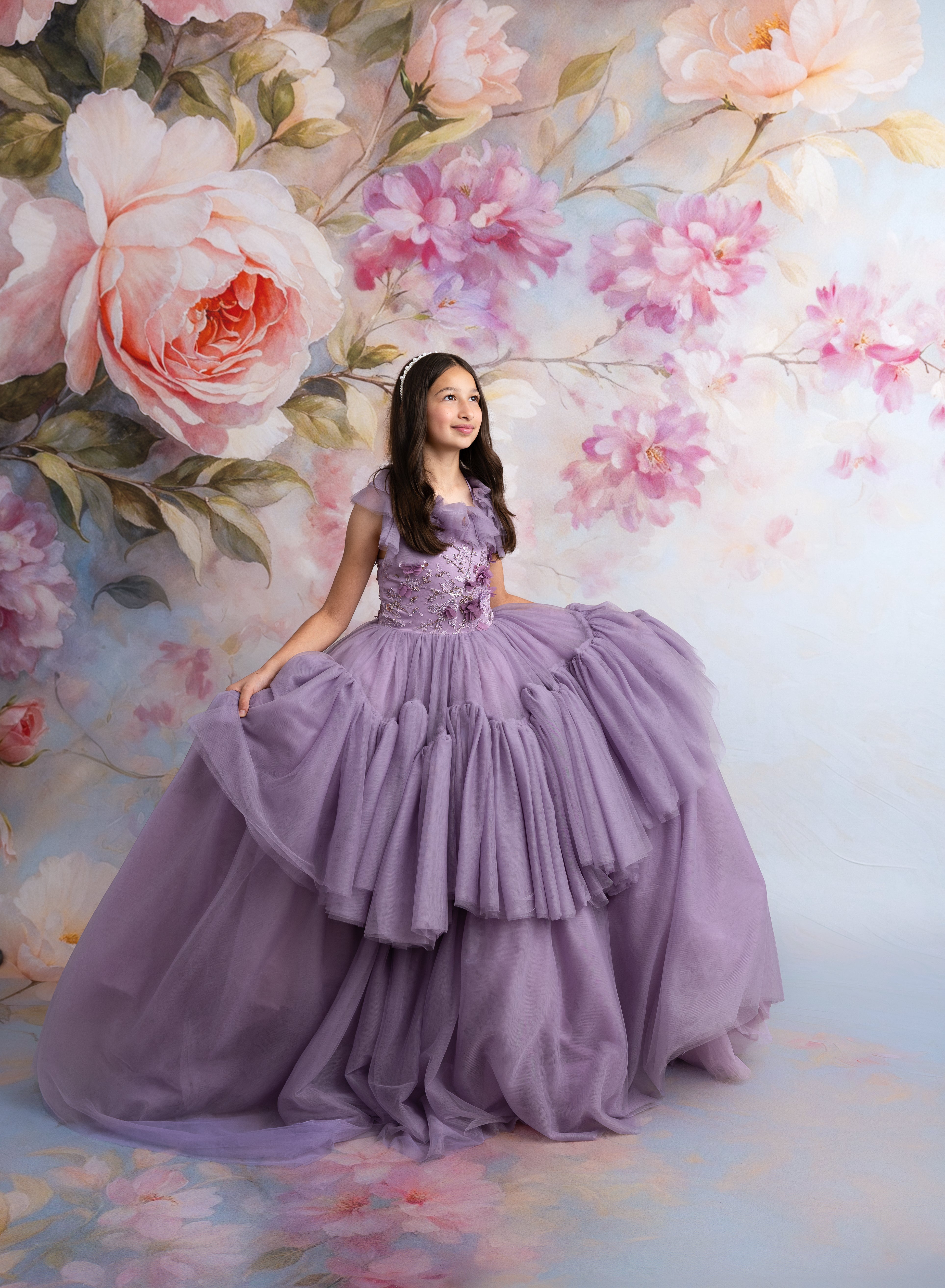 Floor-length Violet Grace gown shown in whimsical, enchanted setting