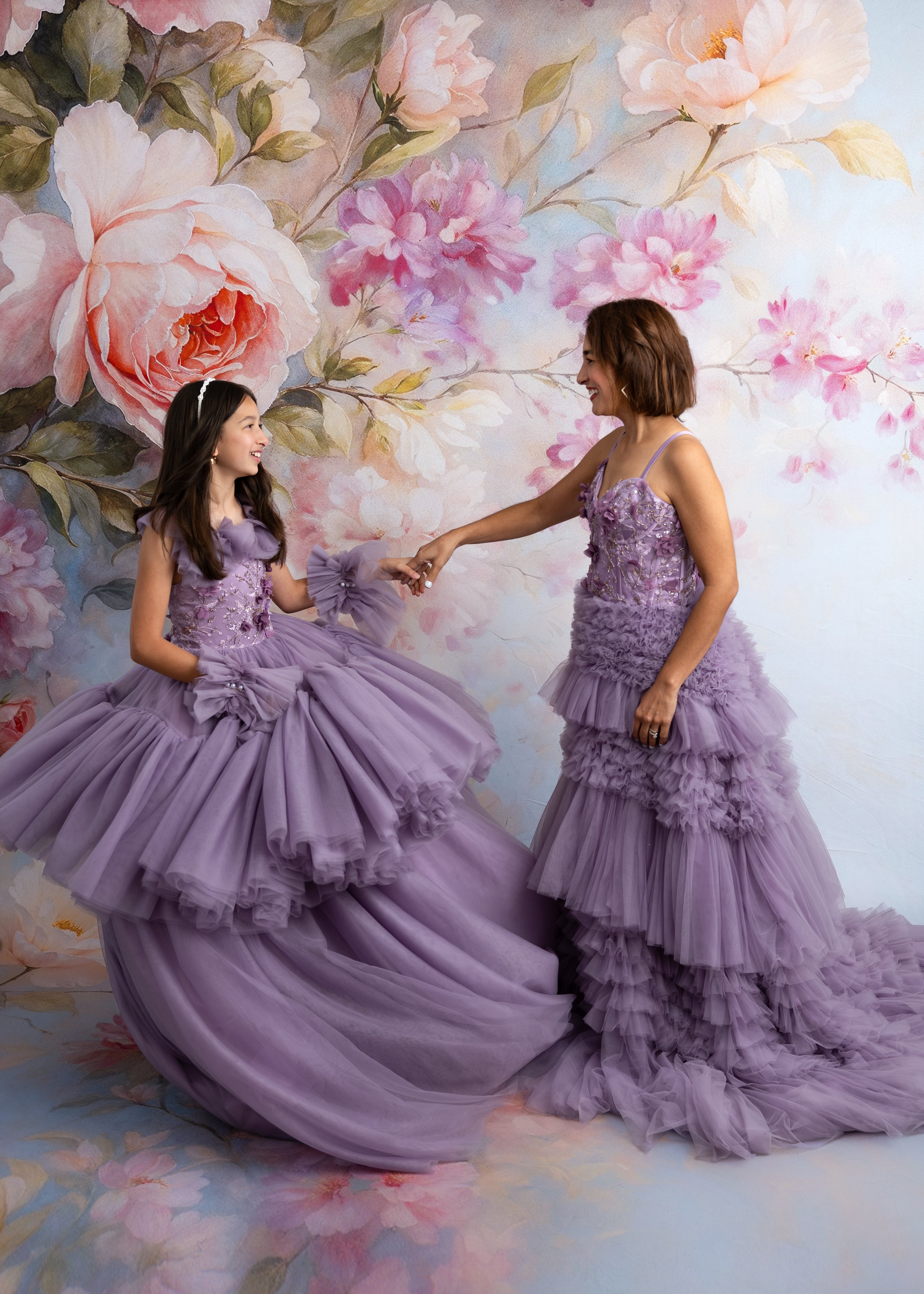 Violet Grace Mommy and Me gowns in a magical setting with soft natural tones