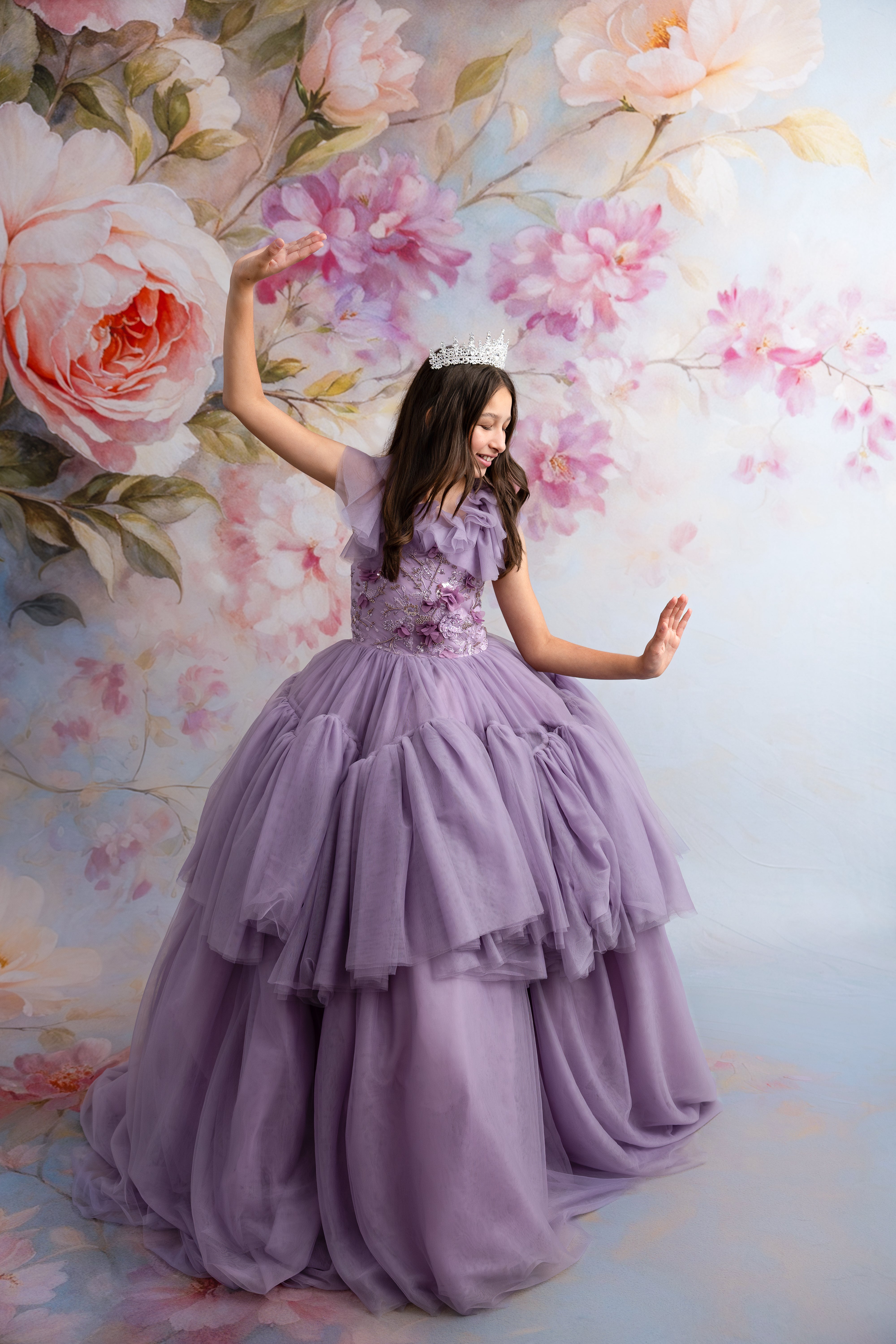 Floor-length Violet Grace gown shown in whimsical, enchanted setting