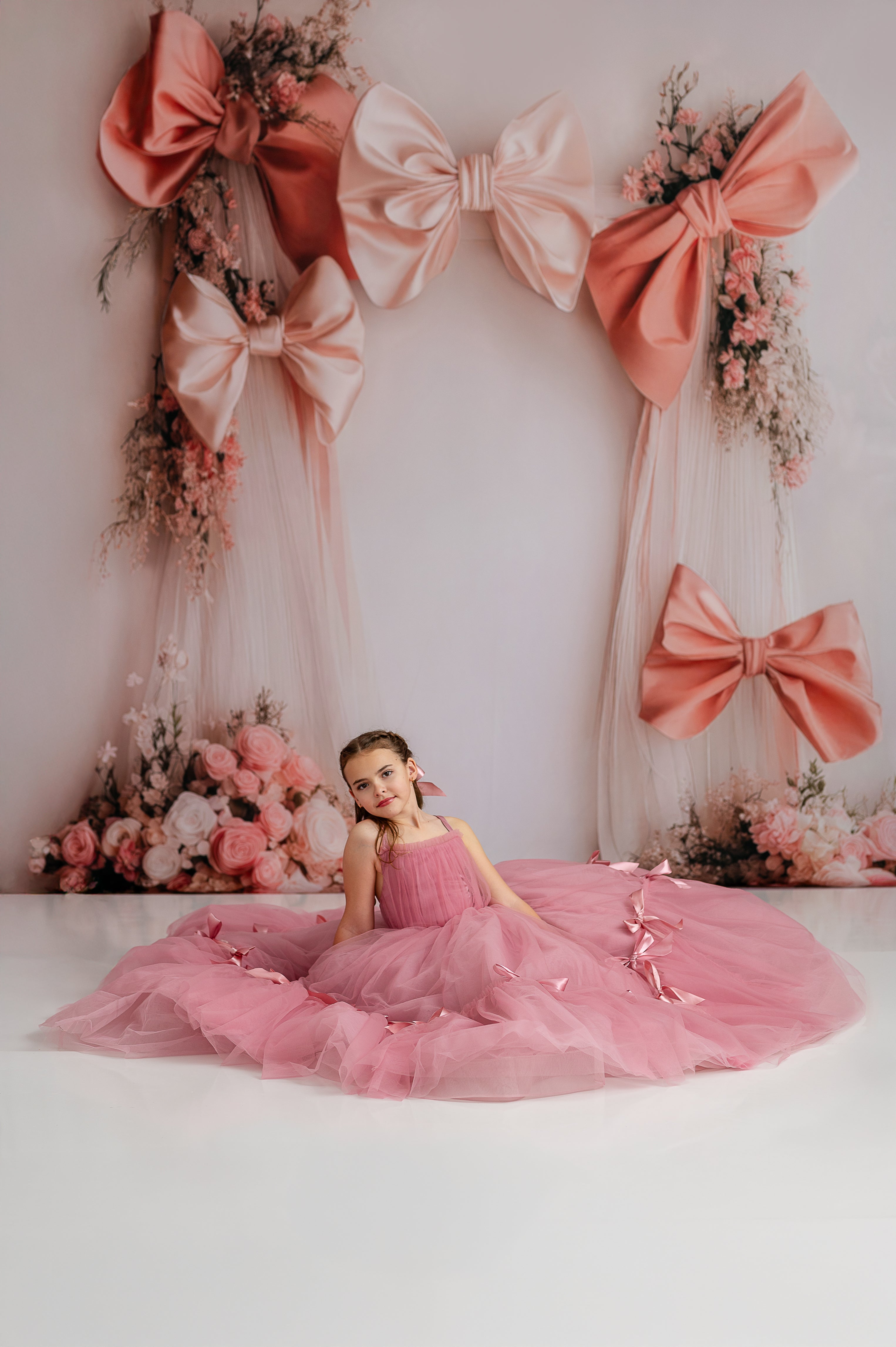 "Flattering silhouette and adjustable shoulder ties for a perfect fit in the Bows of Grace gown."
