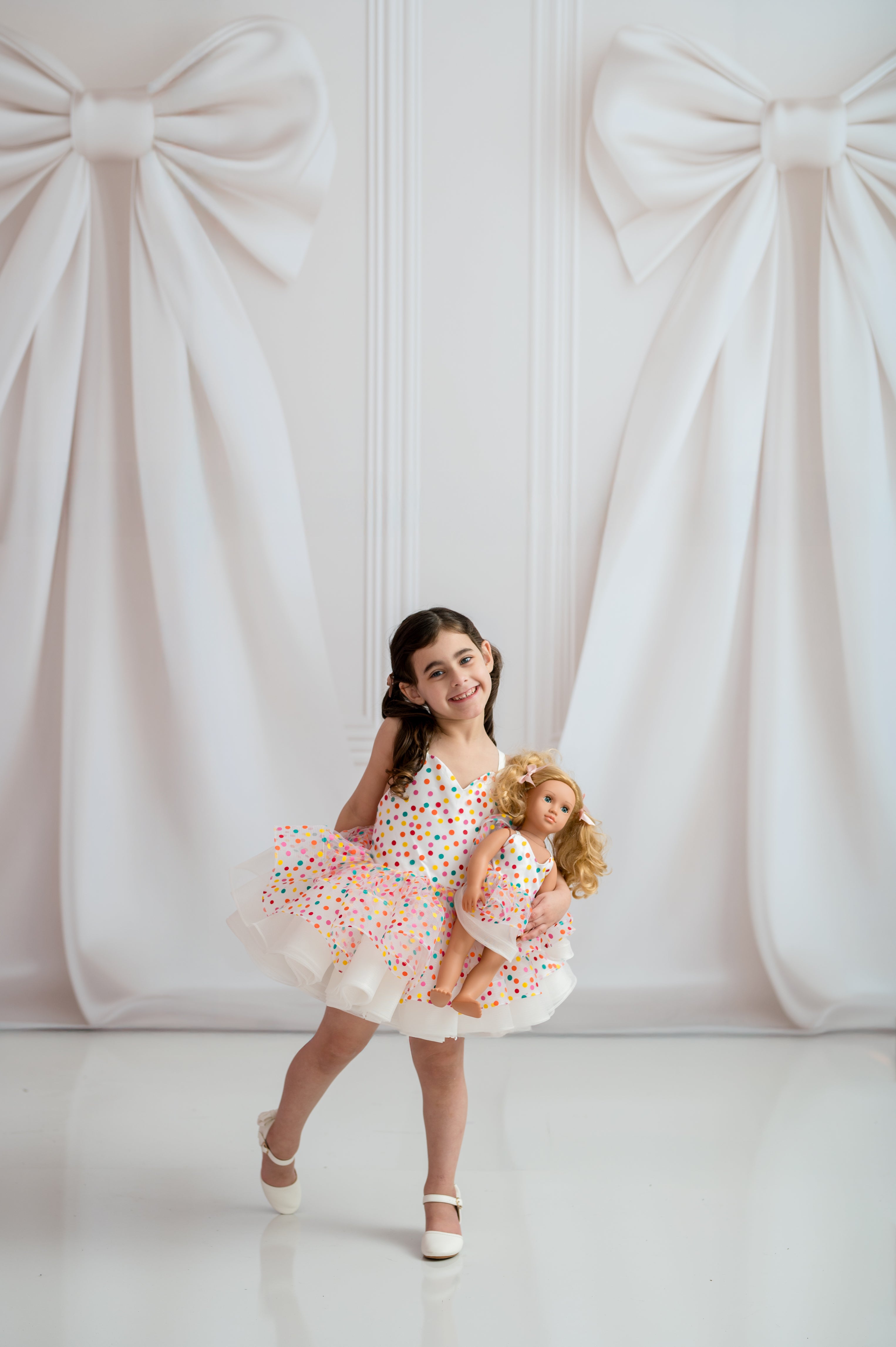 Fine art photograph of colorful polka dot tutu dress on dress form