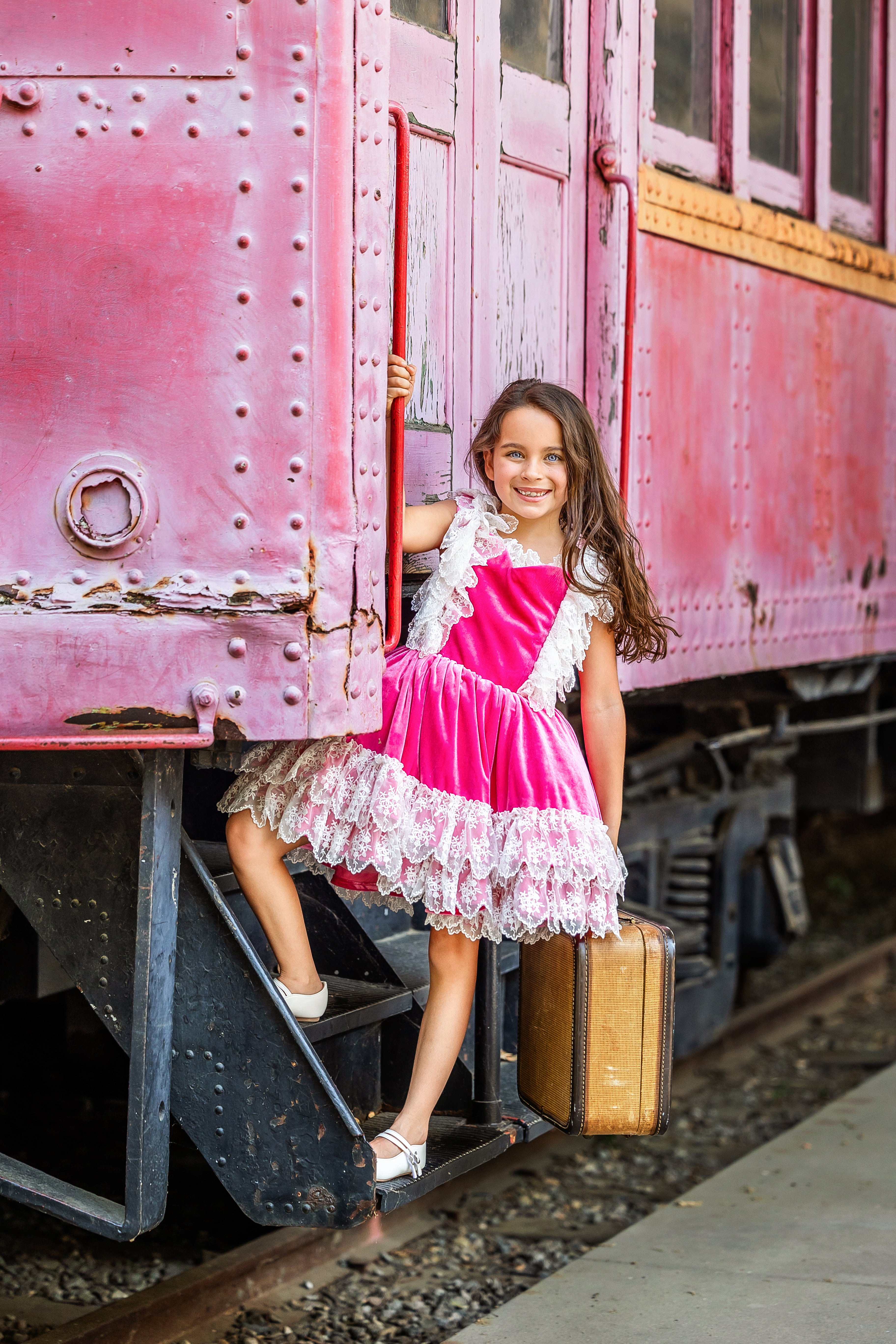 Girl wearing a beautiful pink gown