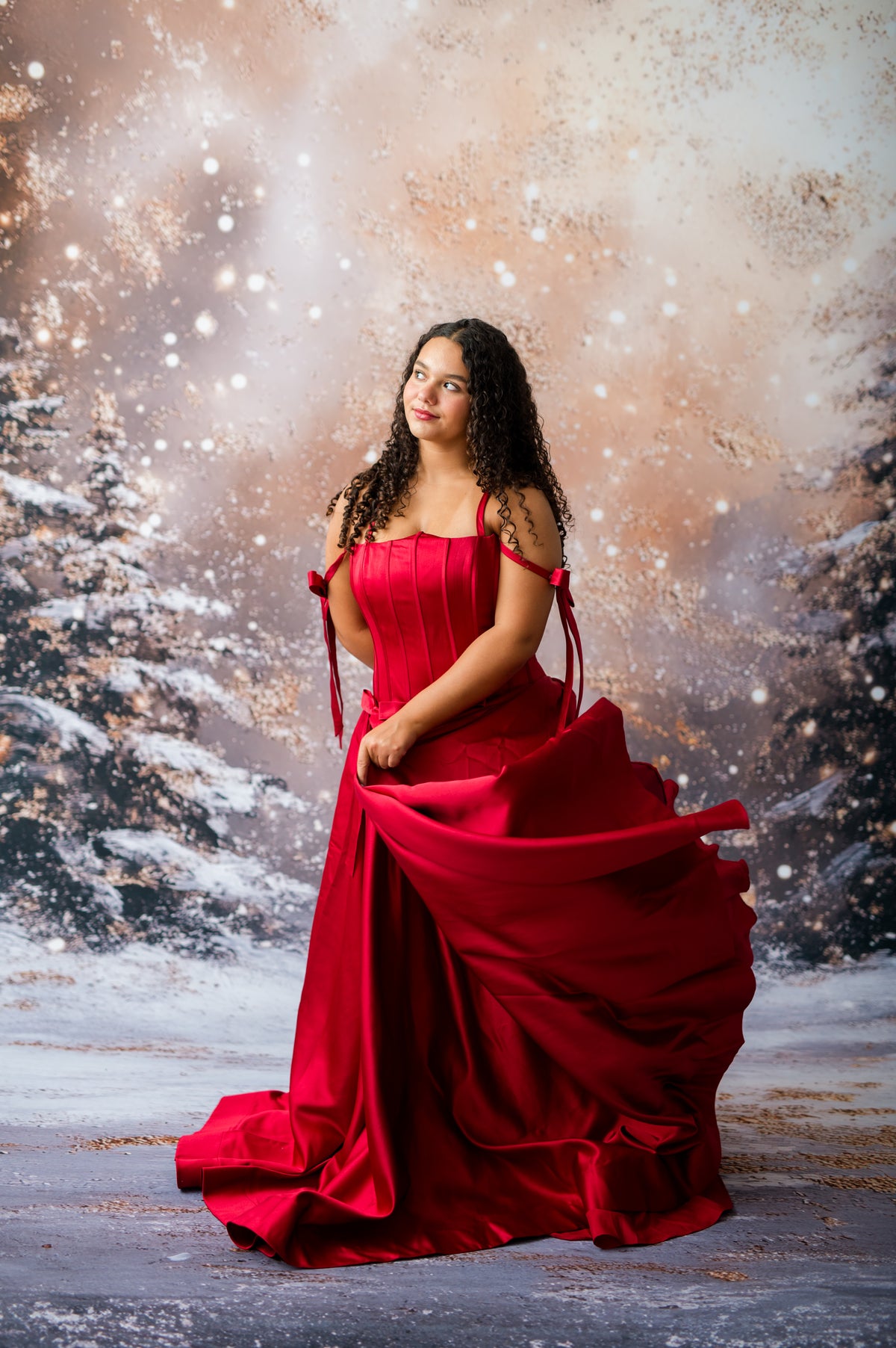 Red satin floor length couture gown with sweetheart corset bodice