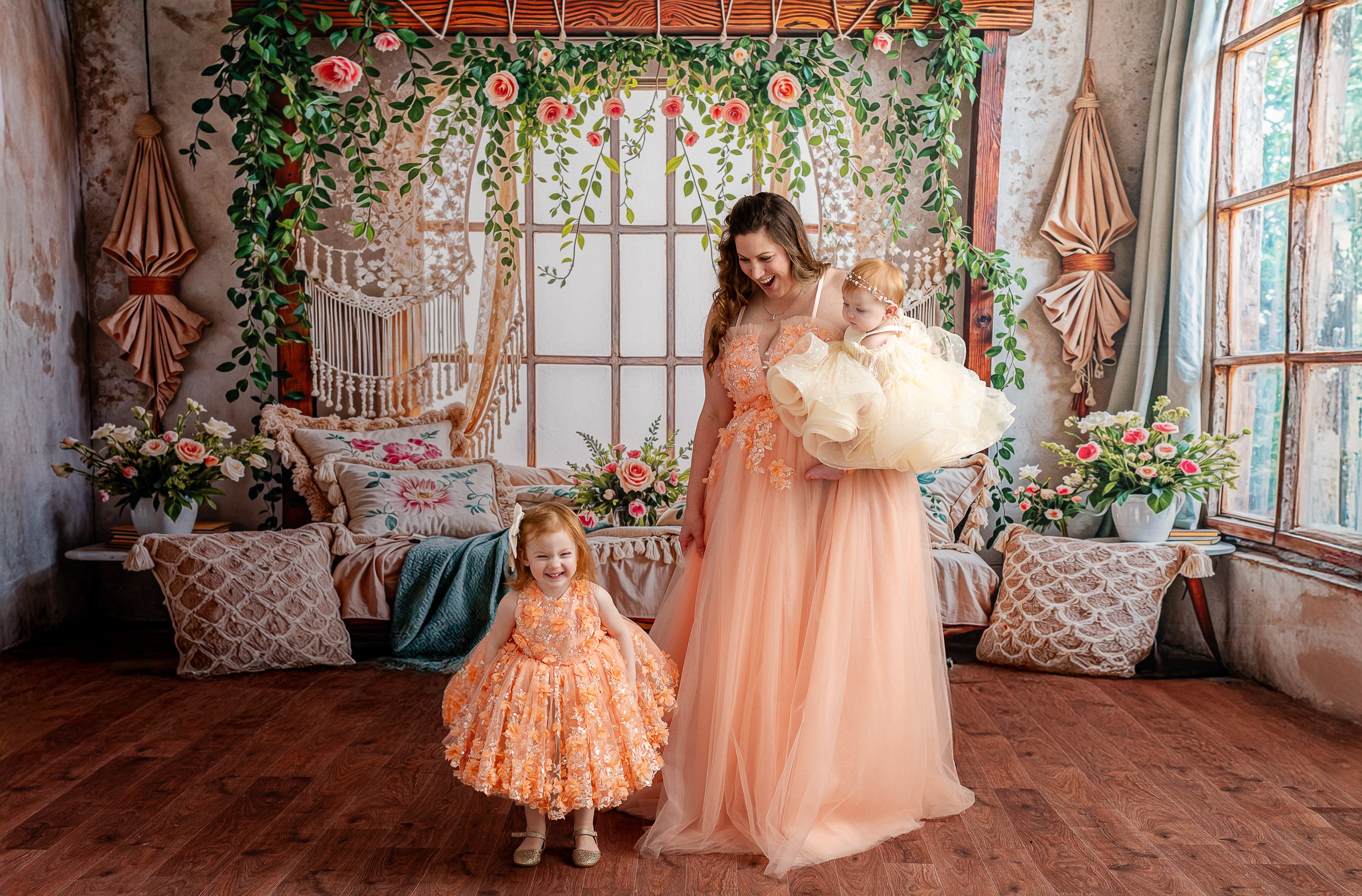 "Peach Blossom Gown with adjustable corset back, combining comfort and elegance, designed for maternity and non-maternity wear."