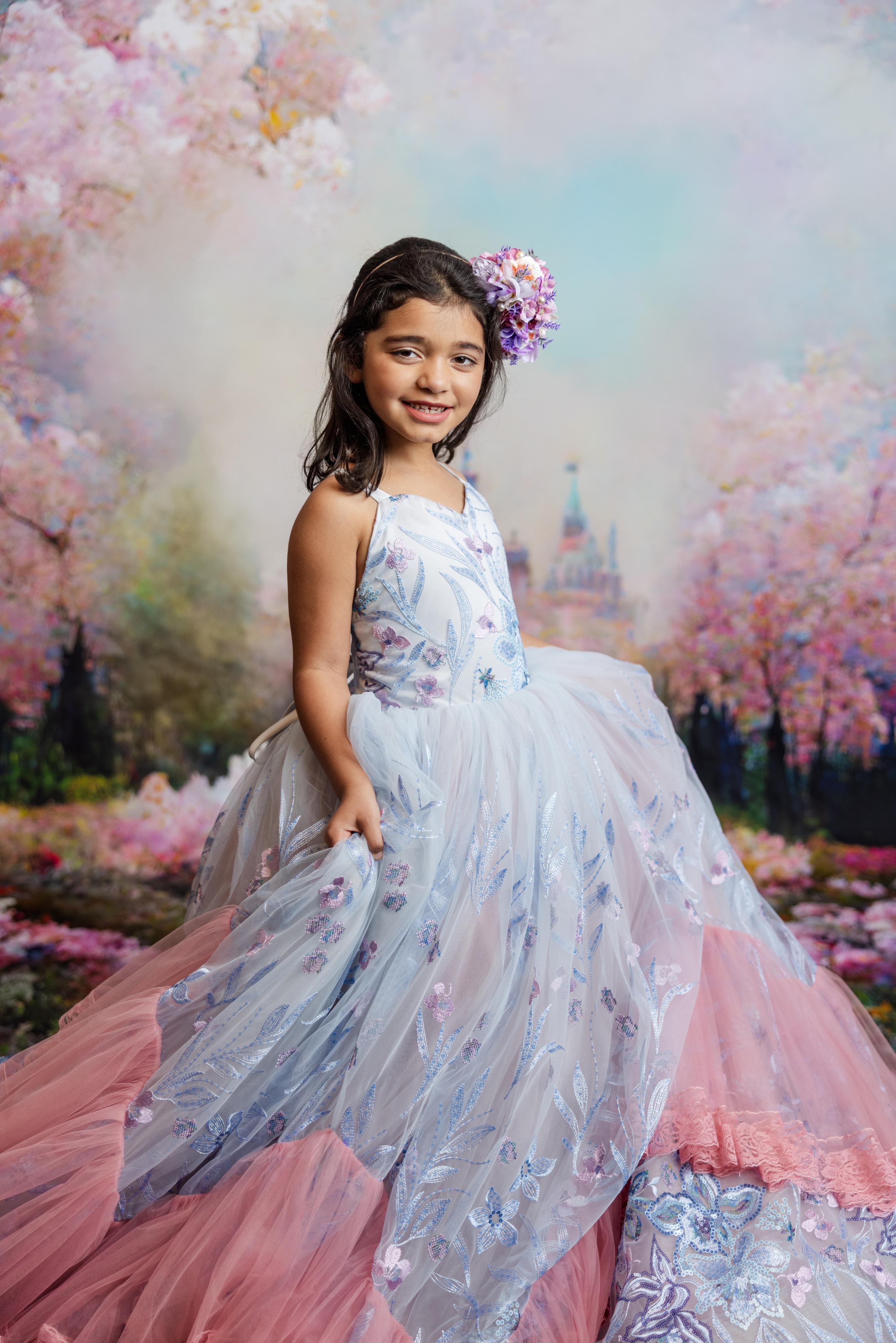 "Savannah Bloom gown with girly lace details and sparkling floral sequin fabric, perfect for a special photoshoot."