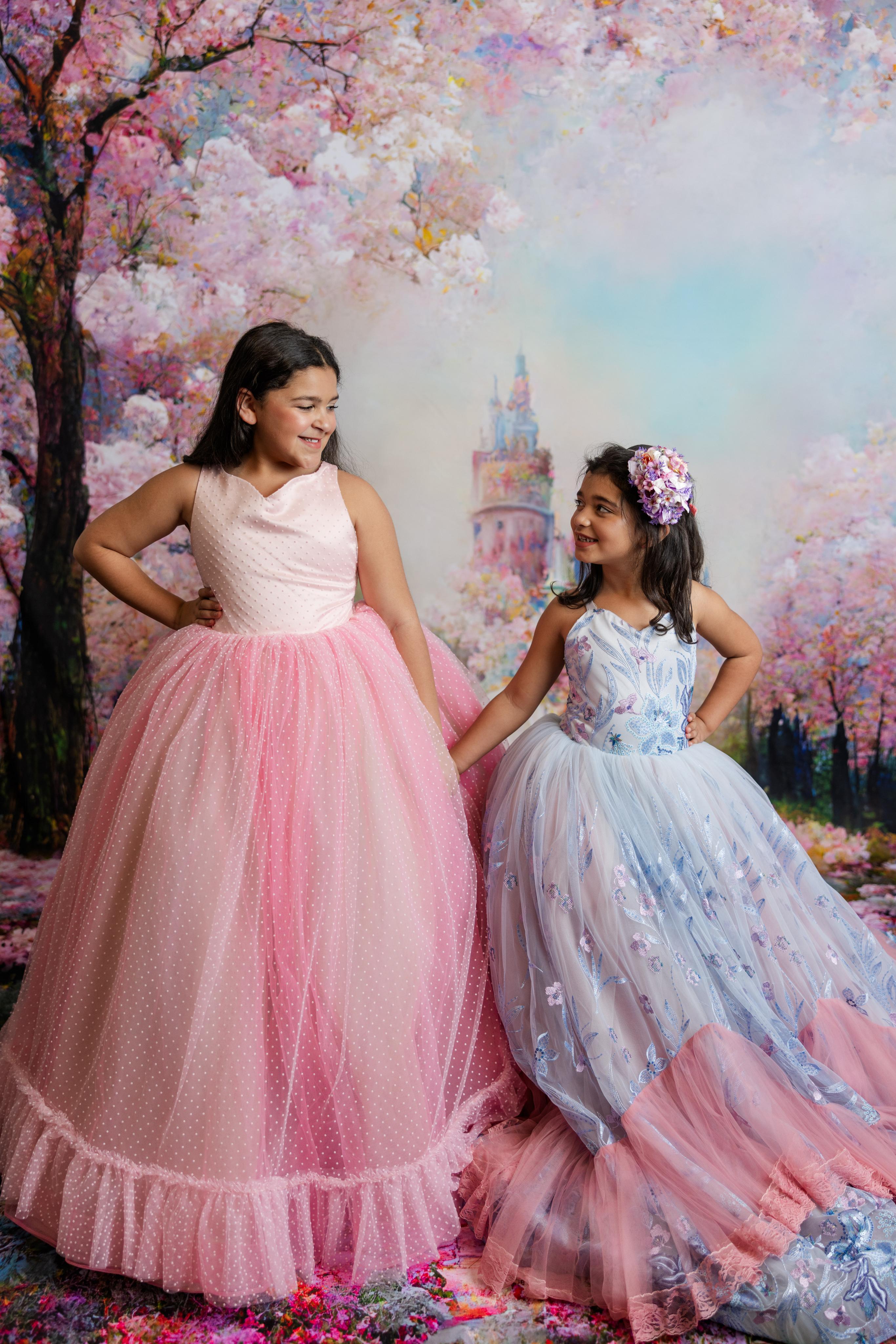 "Close-up of the delicate lace detailing on the bodice of the Savannah Bloom gown, designed for petite princesses."
