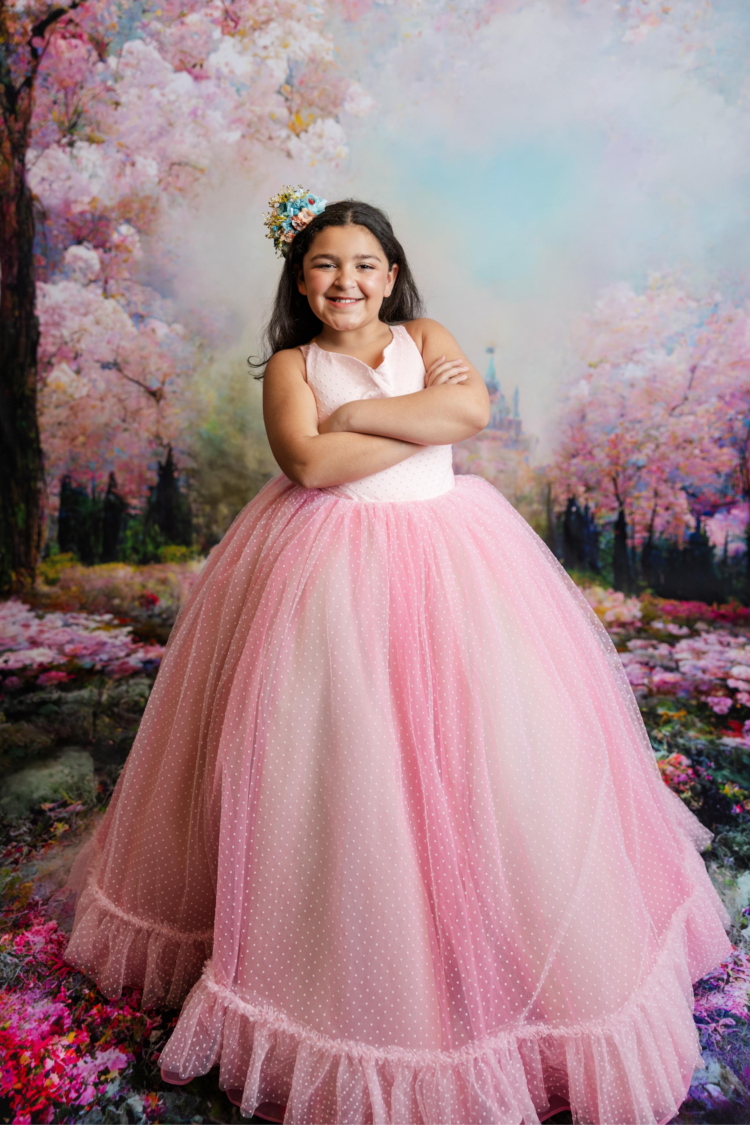 "Soft tulle skirt of the Swish Dot Couture gown, layered with pastel shades for an enchanting and dreamy effect."