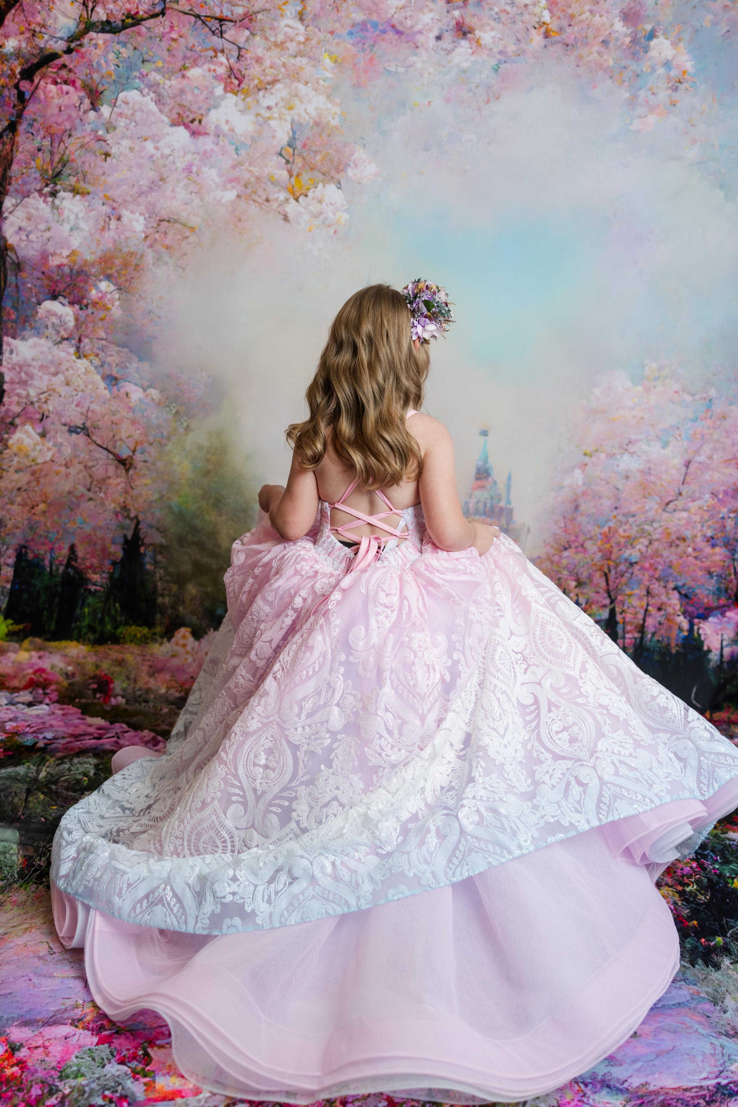 "Back view of the Sugar Kisses gown, designed to provide a flattering fit and comfort for young girls."