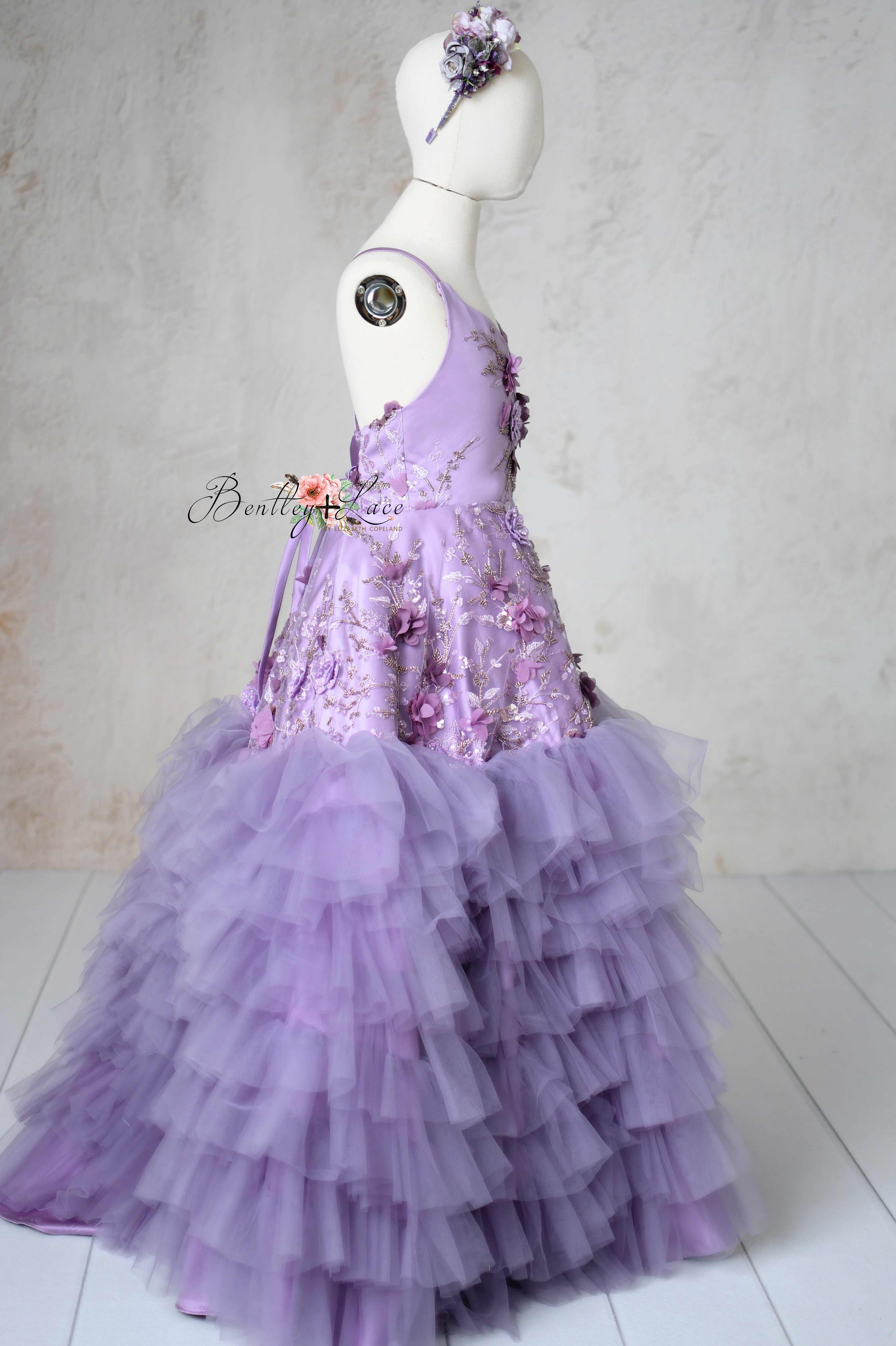 Close-up of intricate floral detailing on the Violet Grace gown.