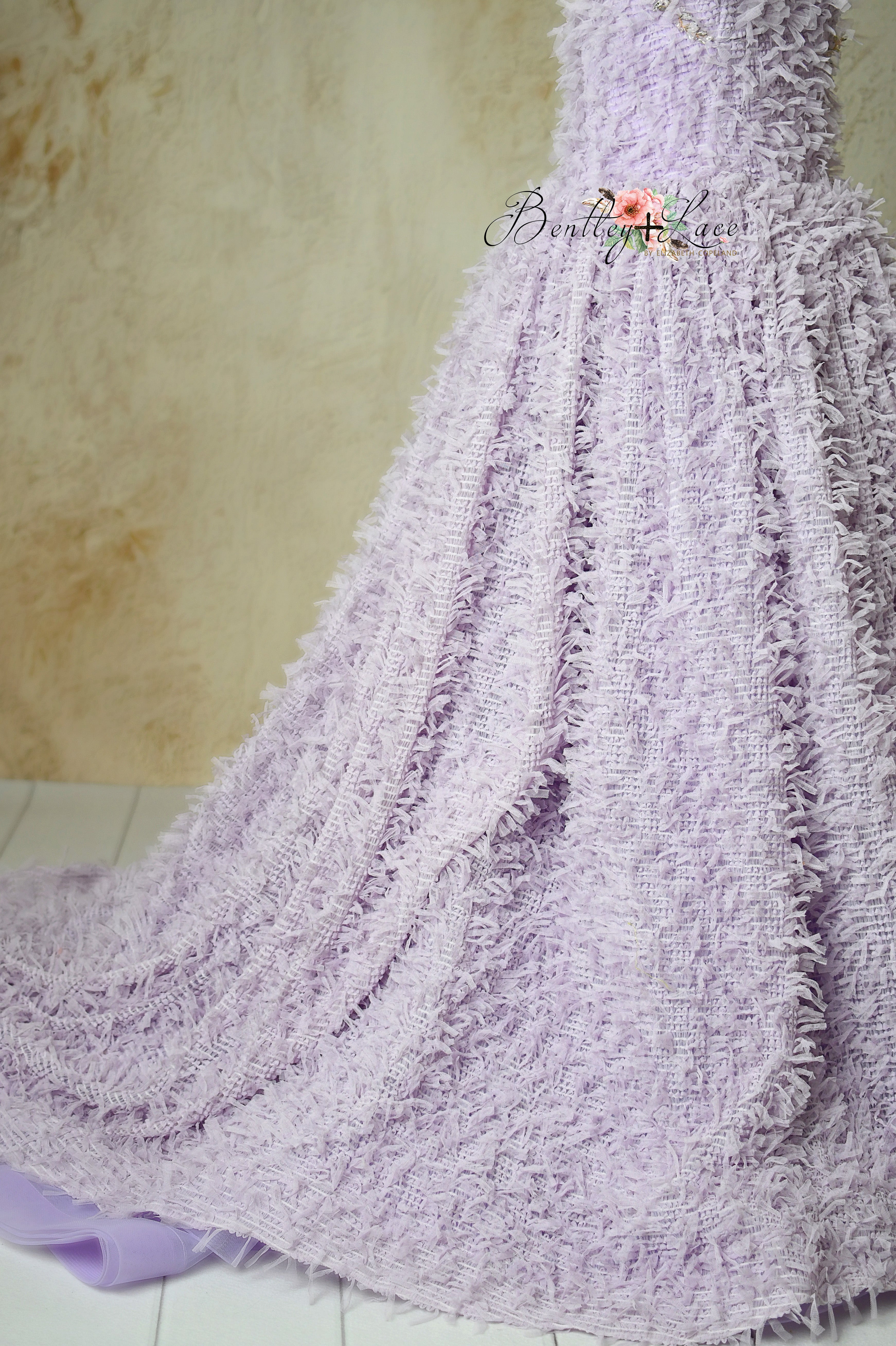 Full view of Aurelia’s Dream lavender gown with adjustable shoulder ties.