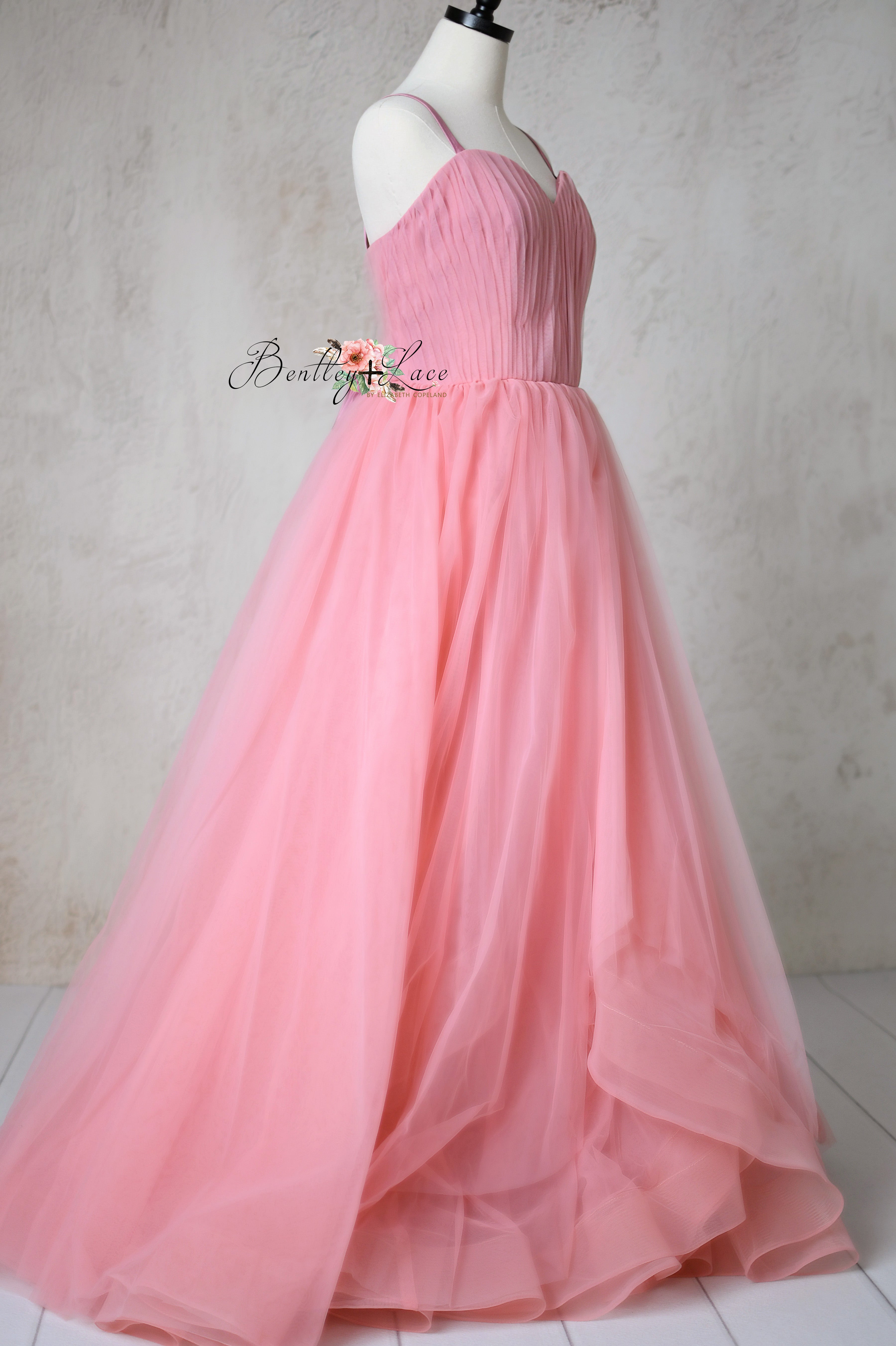 Rosewater Radiance Tulle Gown with romantic sweetheart neckline and ruched detailing.