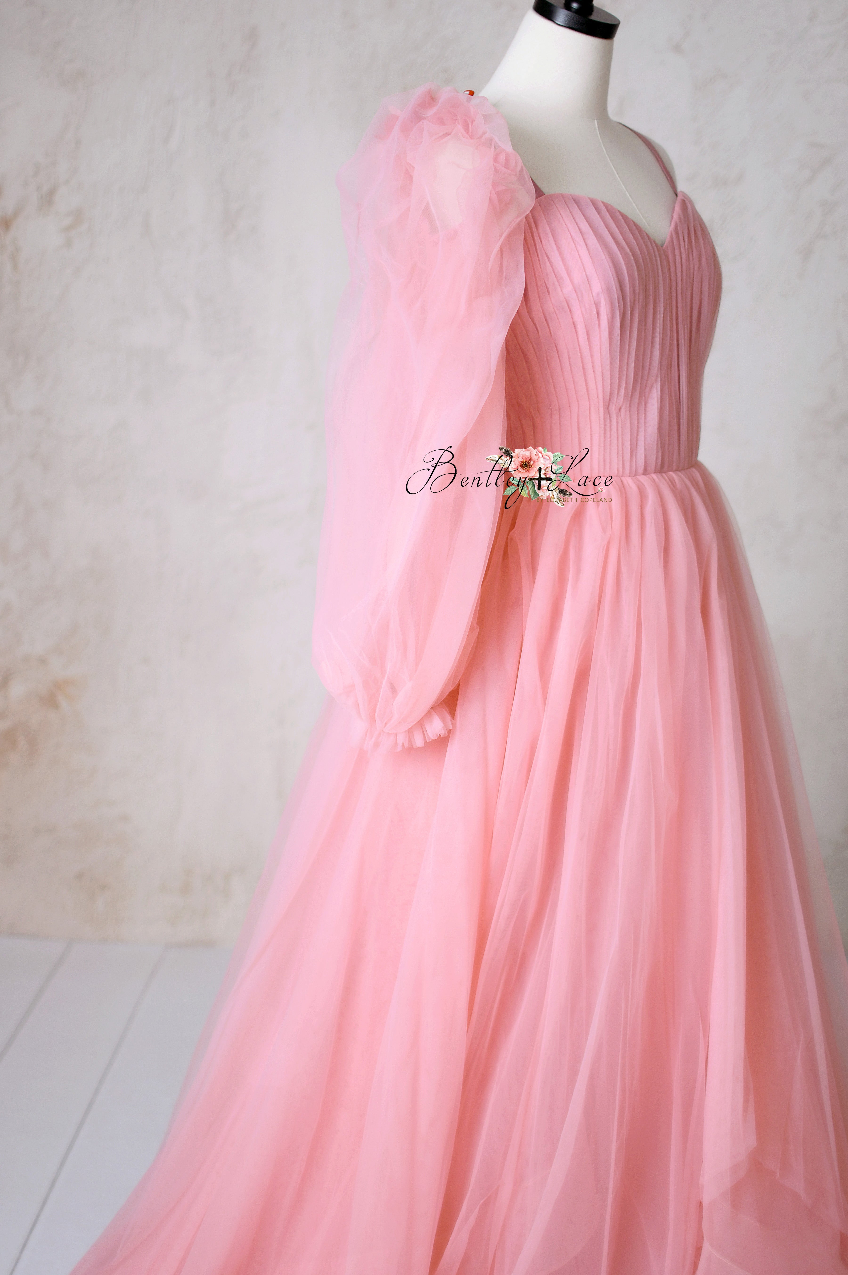 Full, flowing skirt of the Rosewater Radiance gown, creating graceful movement.