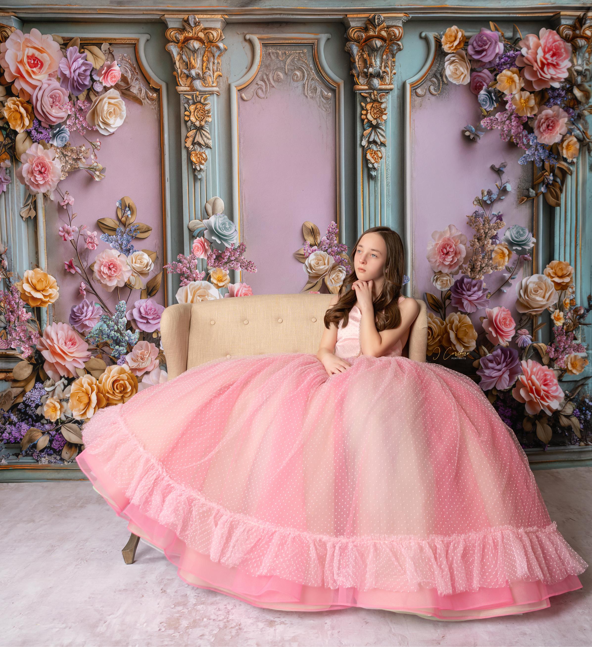 "Pastel couture gown with flowing tulle in pink, sage, and soft blue tones"