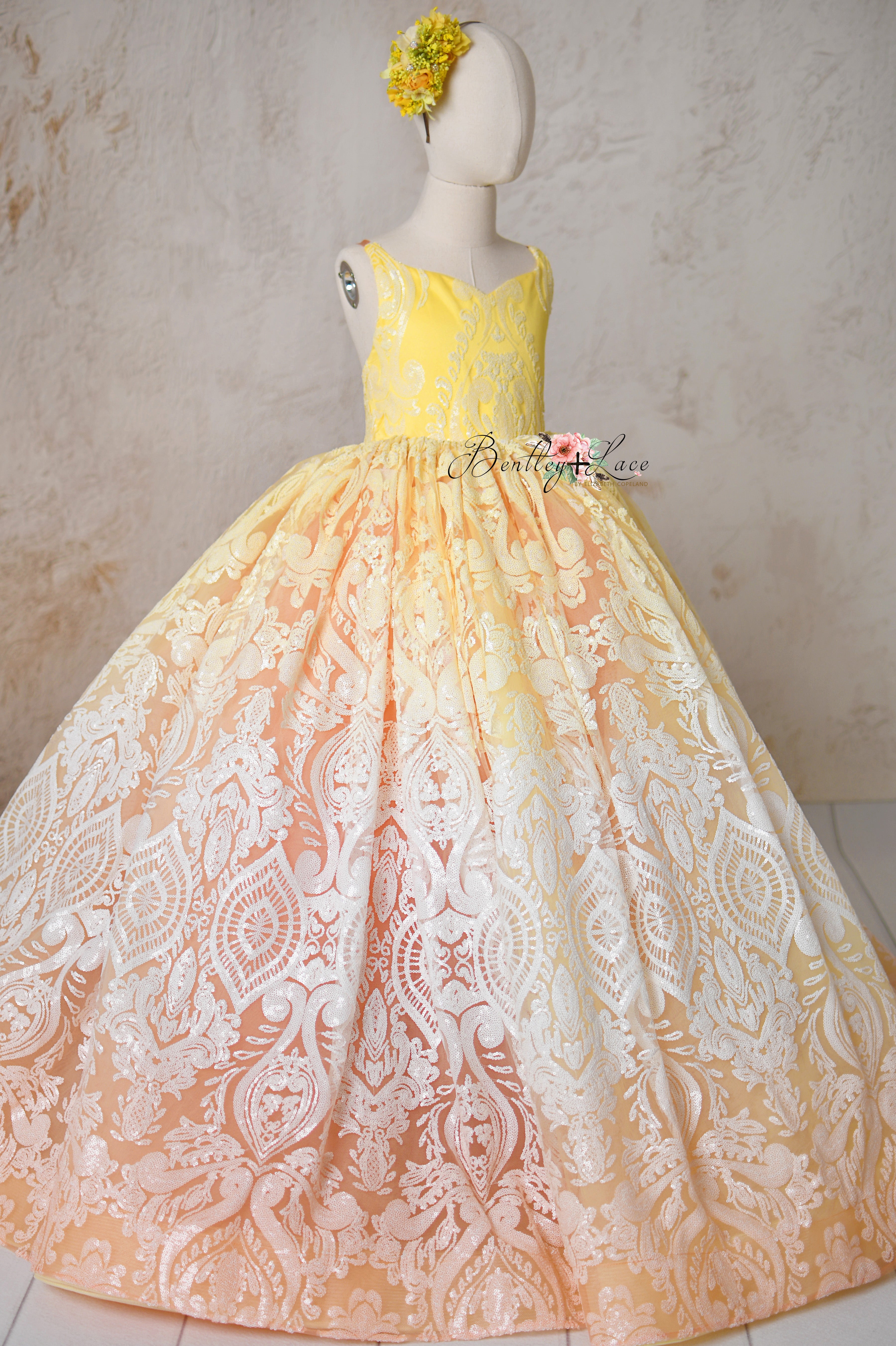 Close-up of intricate lace detailing on the "Sugar Kisses" dress.