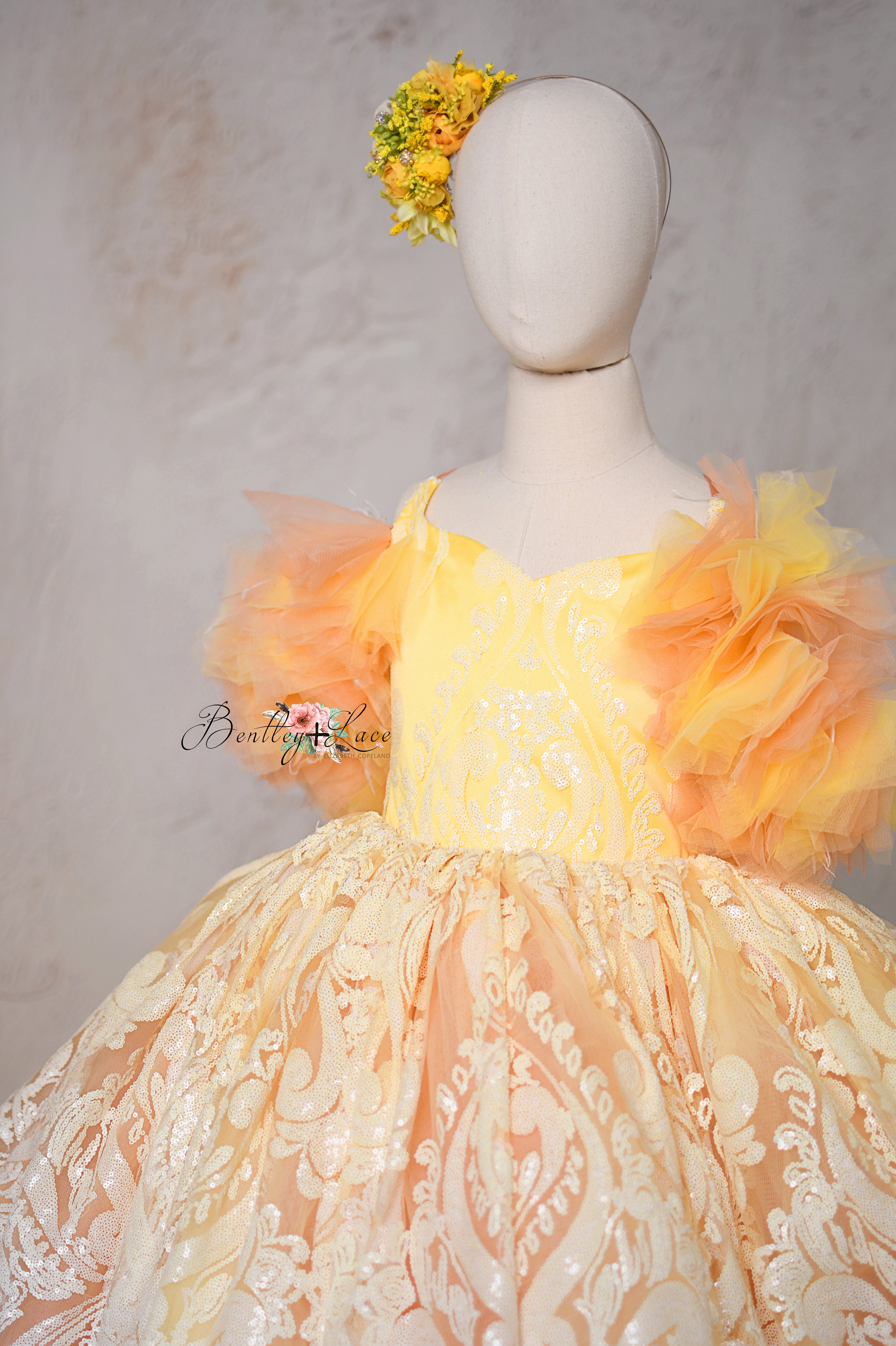 Detachable ruffle off-shoulder sleeves on the "Sugar Kisses" dress.