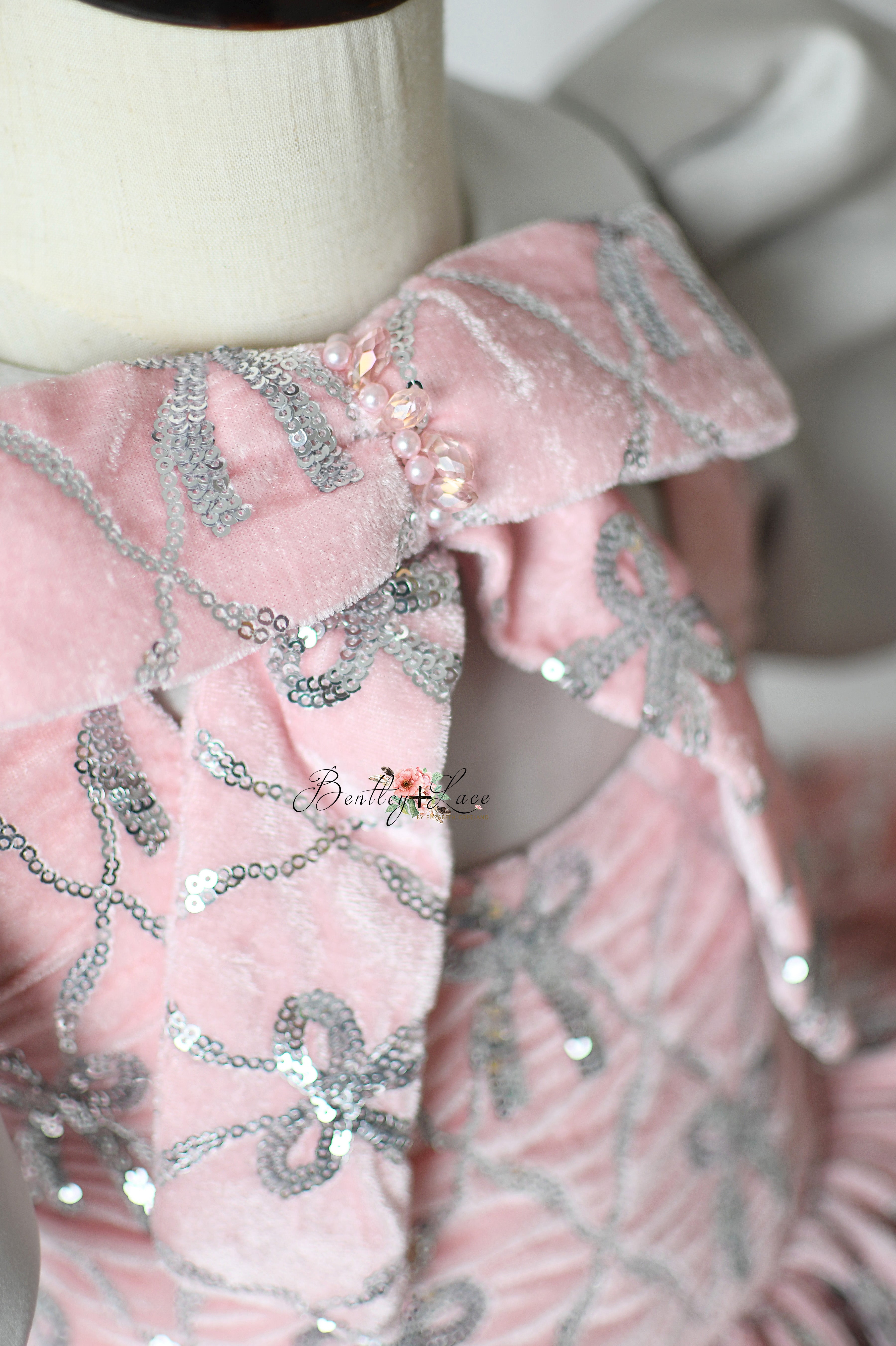 "Luxury toddler dress with bows and satin puff sleeves"