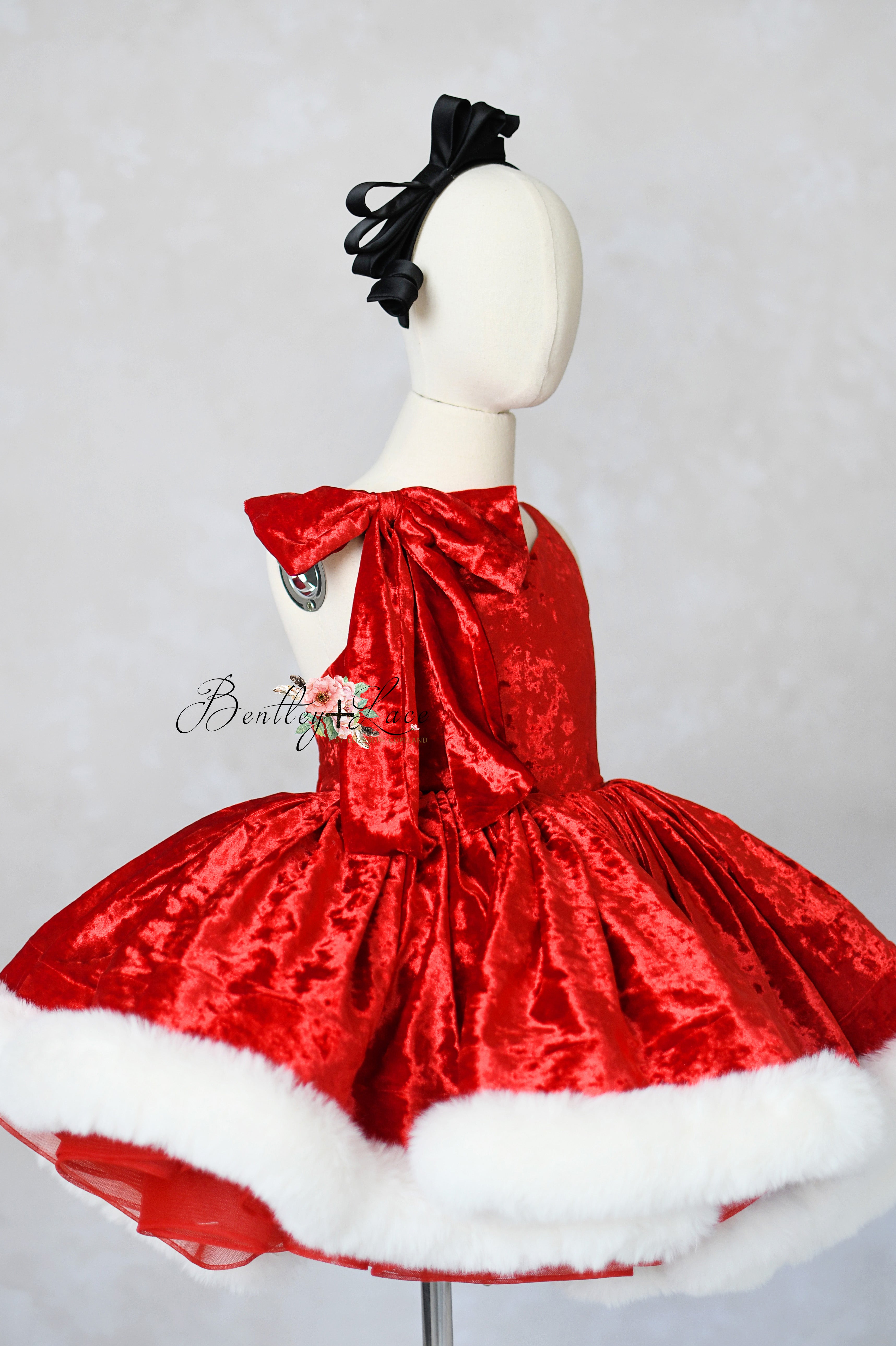 Full view of Mrs. Claus dress showing detailed faux fur trim