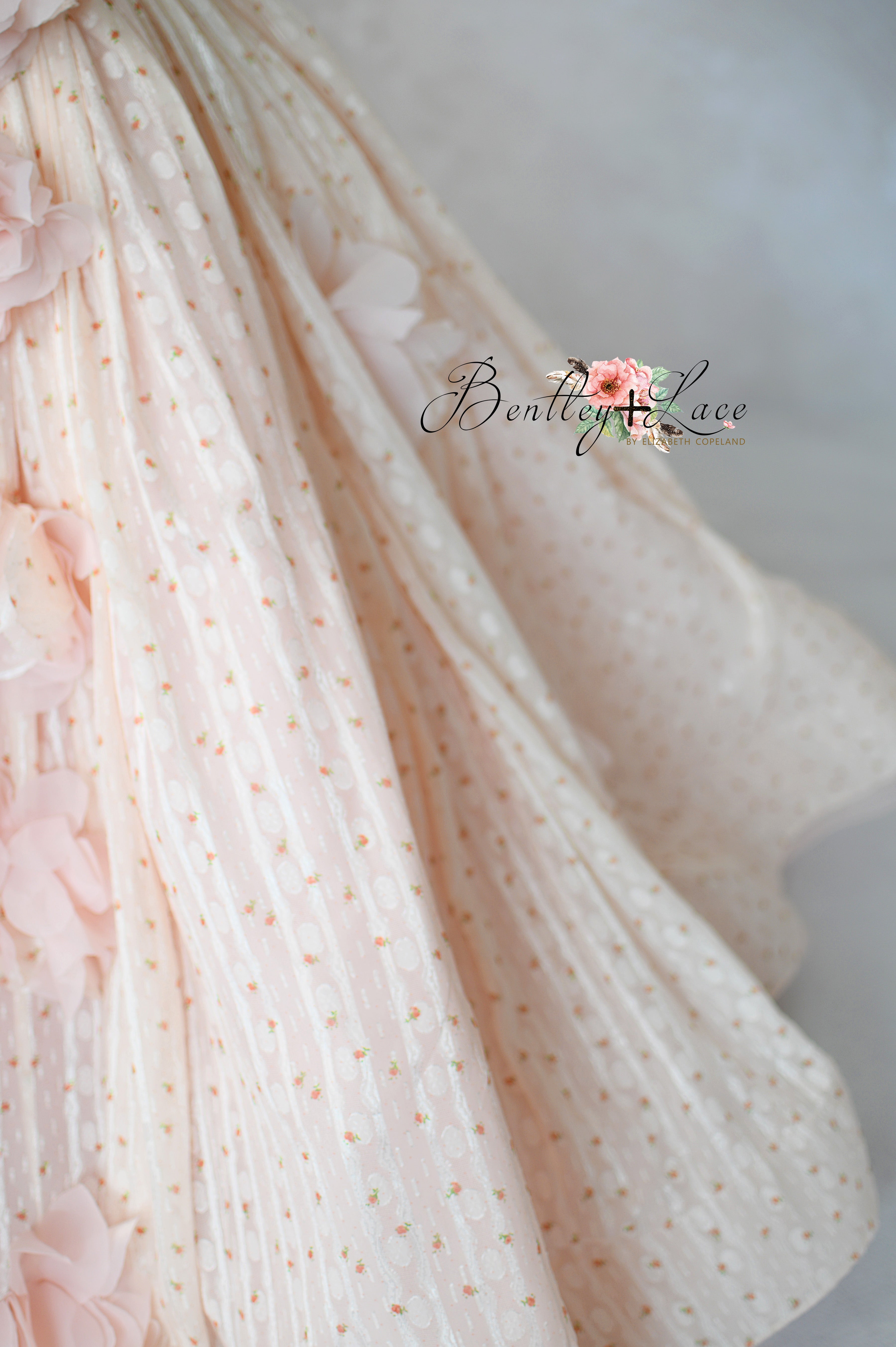 "Designer ball gown for girls in blush with textured polka dot fabric"