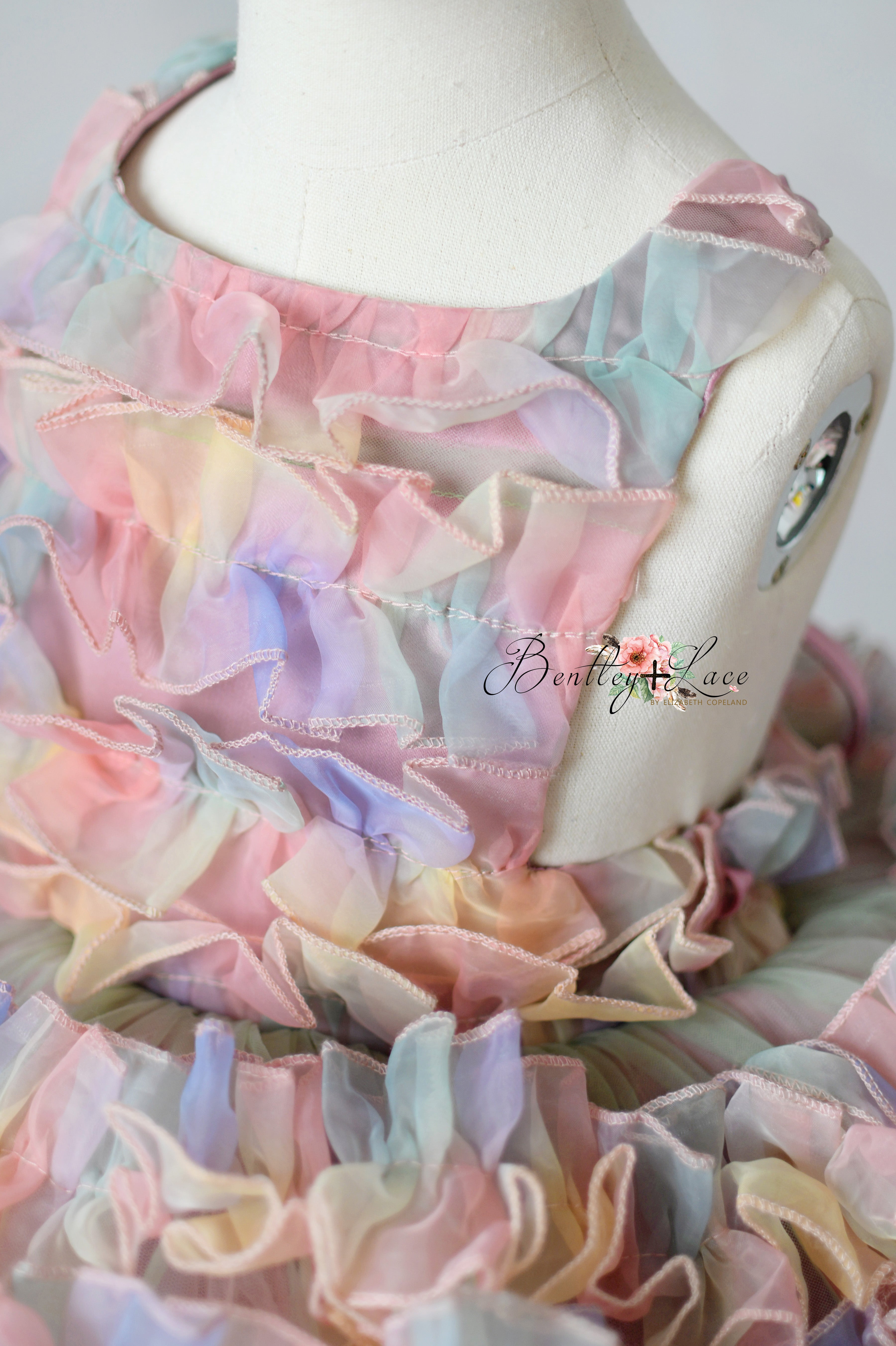 Styled setup with gown on child mannequin – perfect for marketing