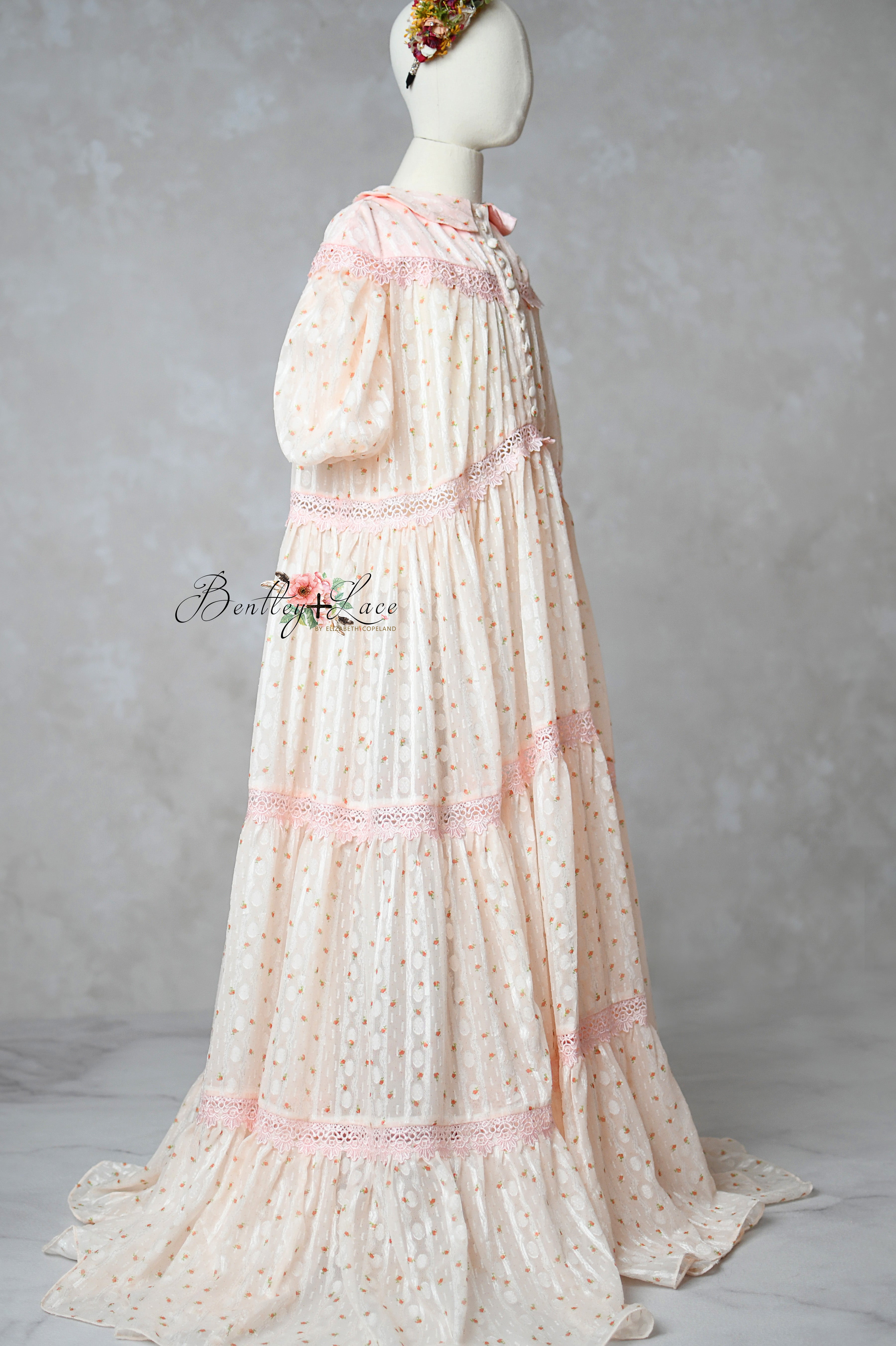 Sugar Rosette floor-length gown displayed with slip dress