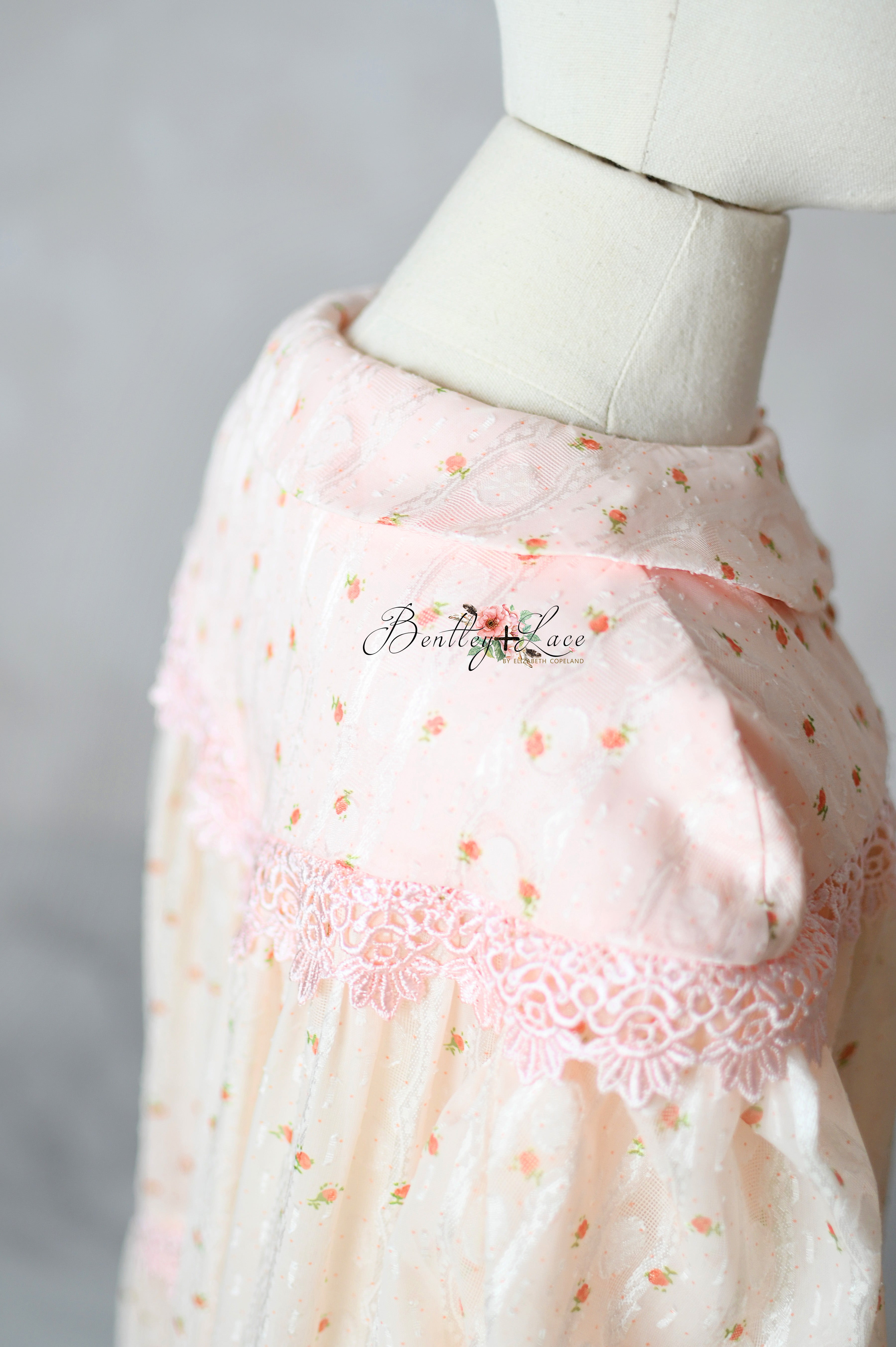 Close-up of lace and rosette detailing on Sugar Rosette dress