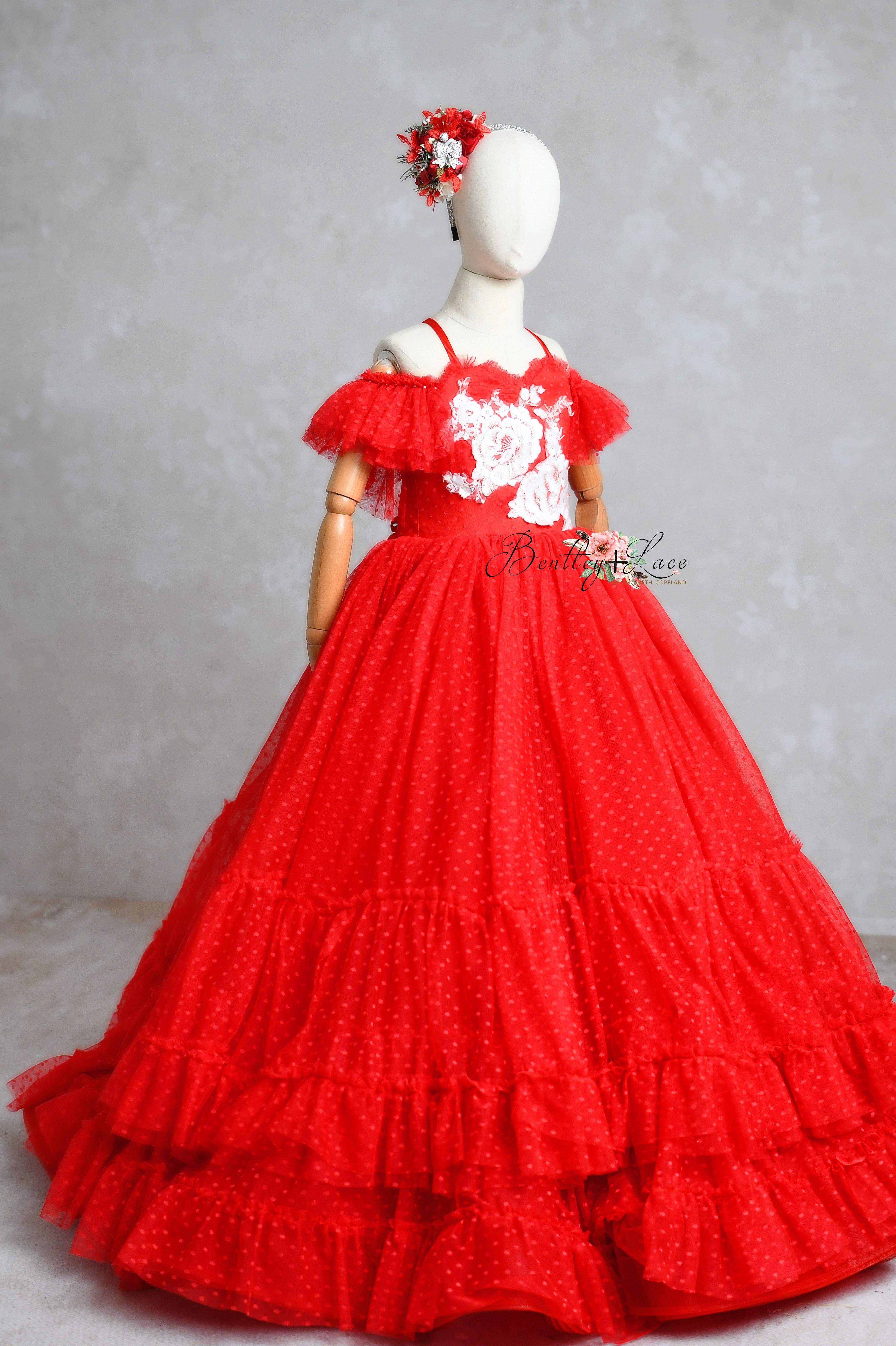 Stylish and comfortable red Swish Dot Couture dress for girls.