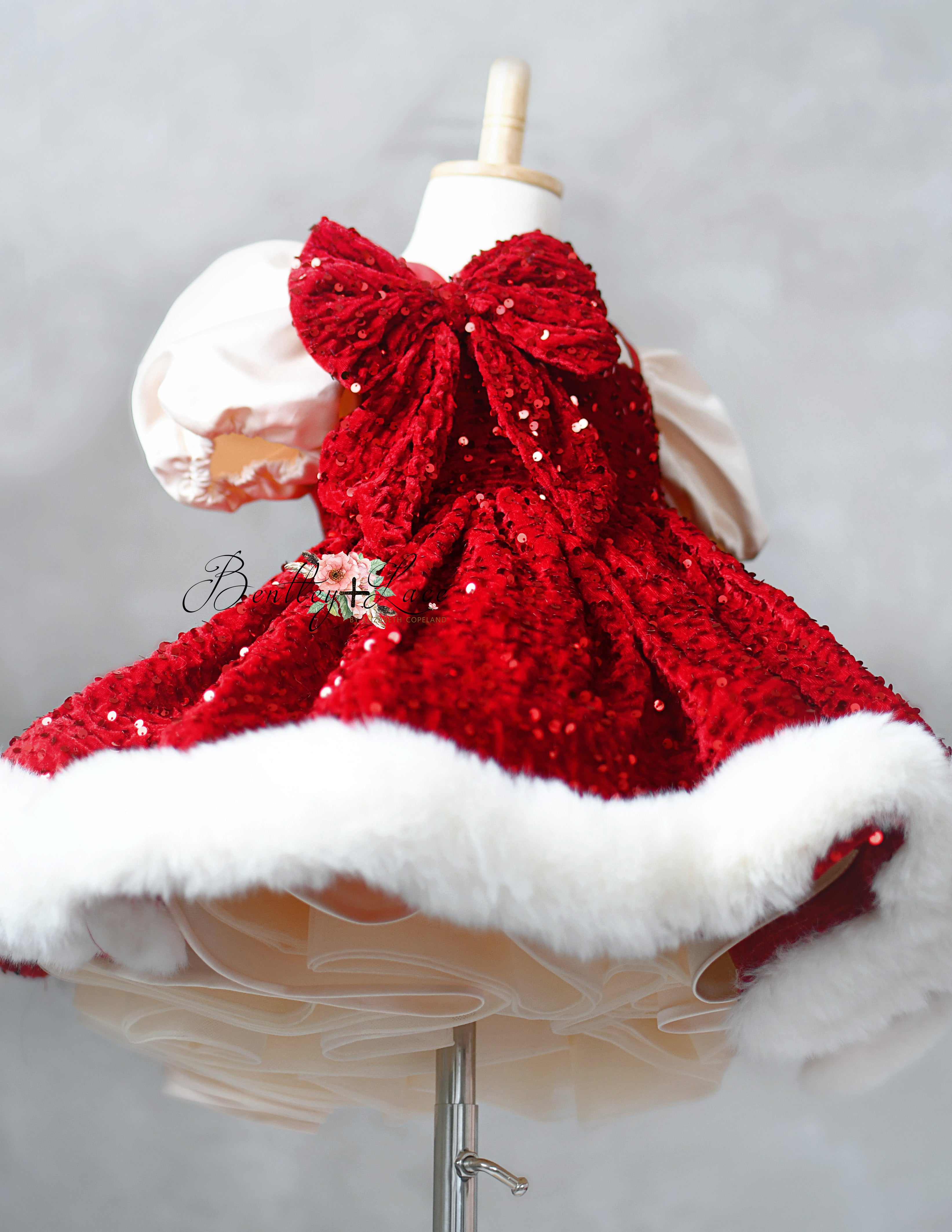 Twirl-worthy holiday dress trimmed with cozy faux fur.