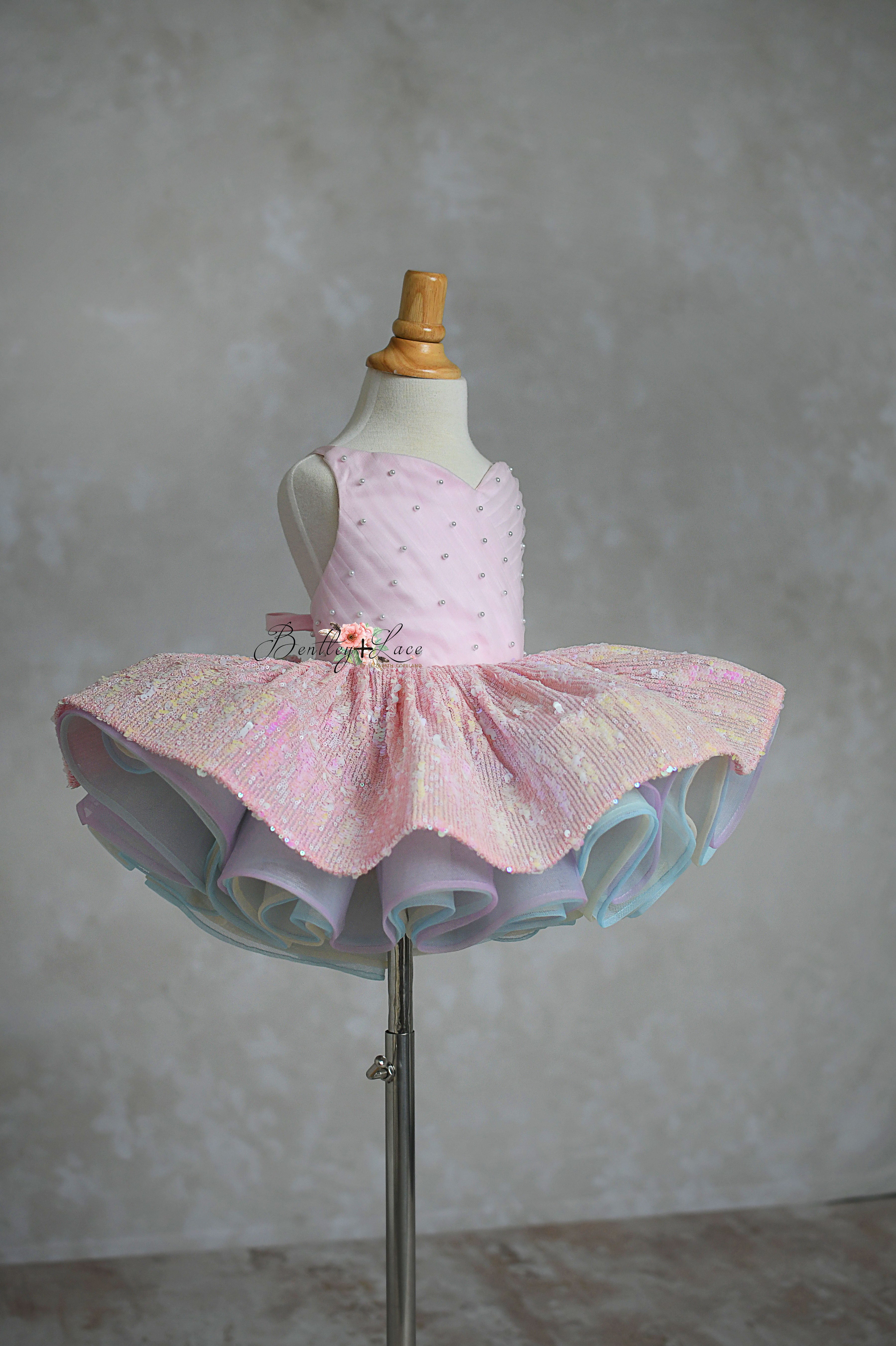 Pink sequin 'Speak Now Gown' with rainbow tulle layers for young Swifties.