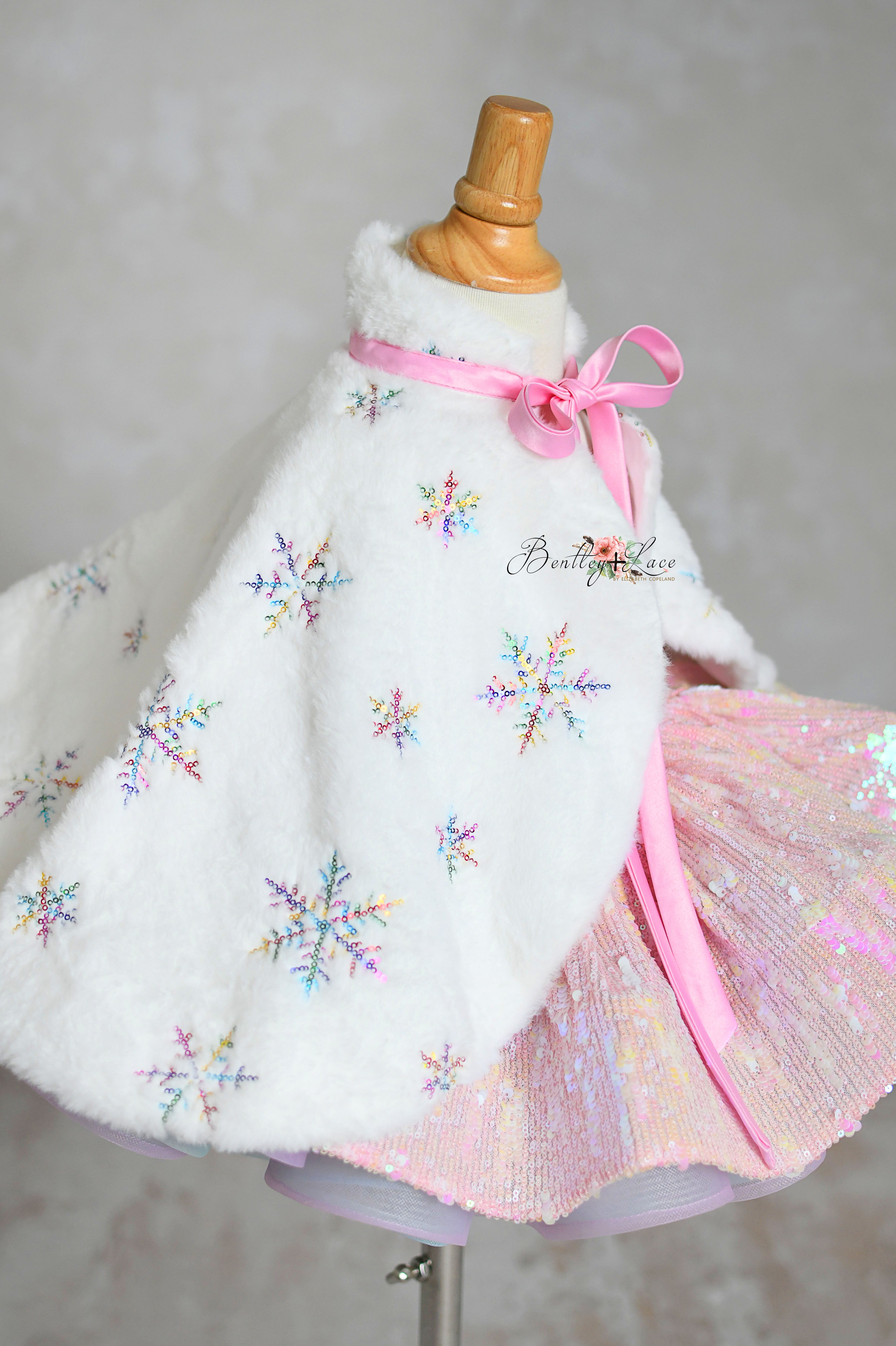 Enchanting pink sequin dress 'Speak Now Gown' with bridal-soft rainbow tulle.