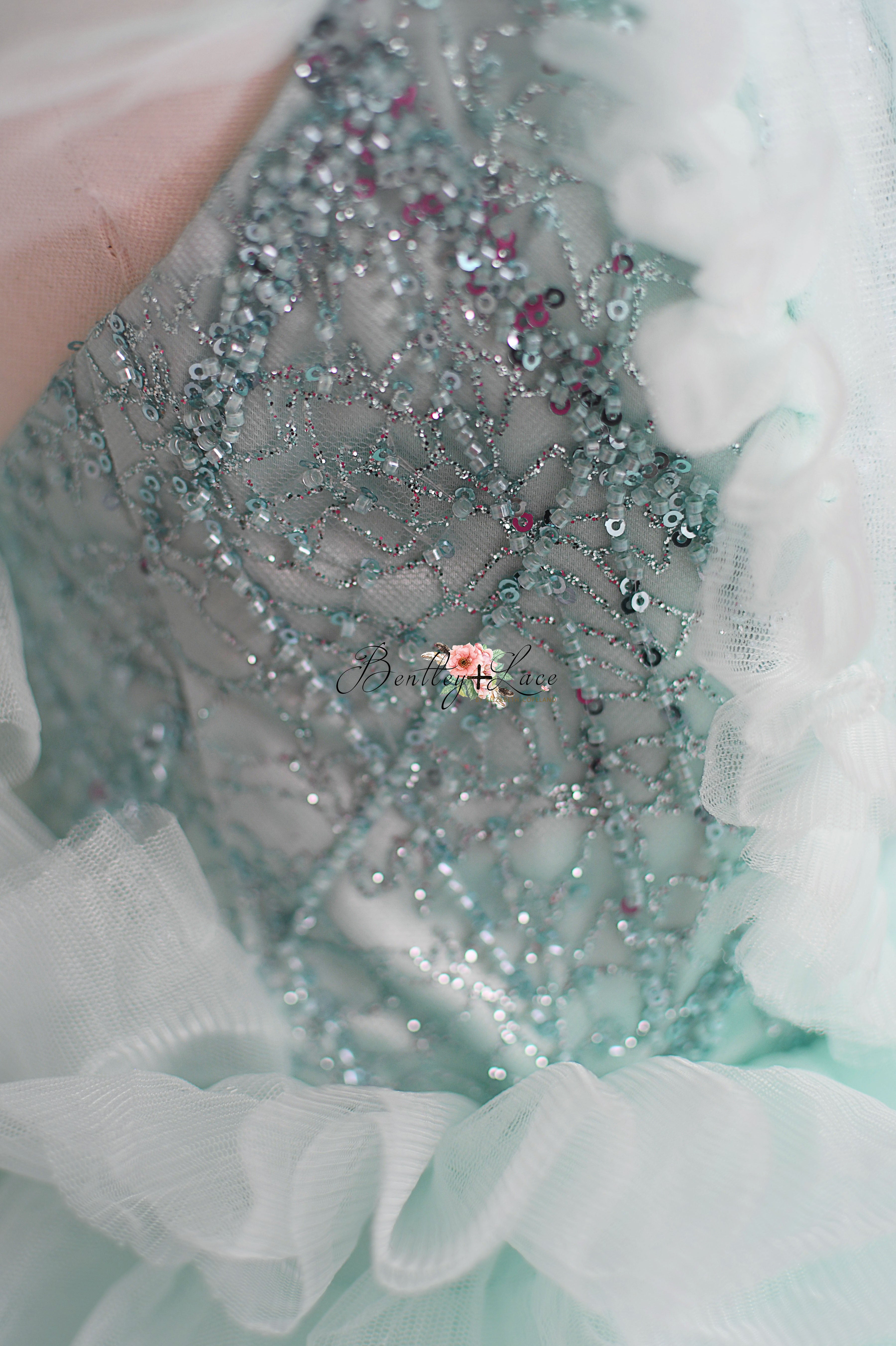 Aqua ruffled gown for girls by Bentley & Lace.