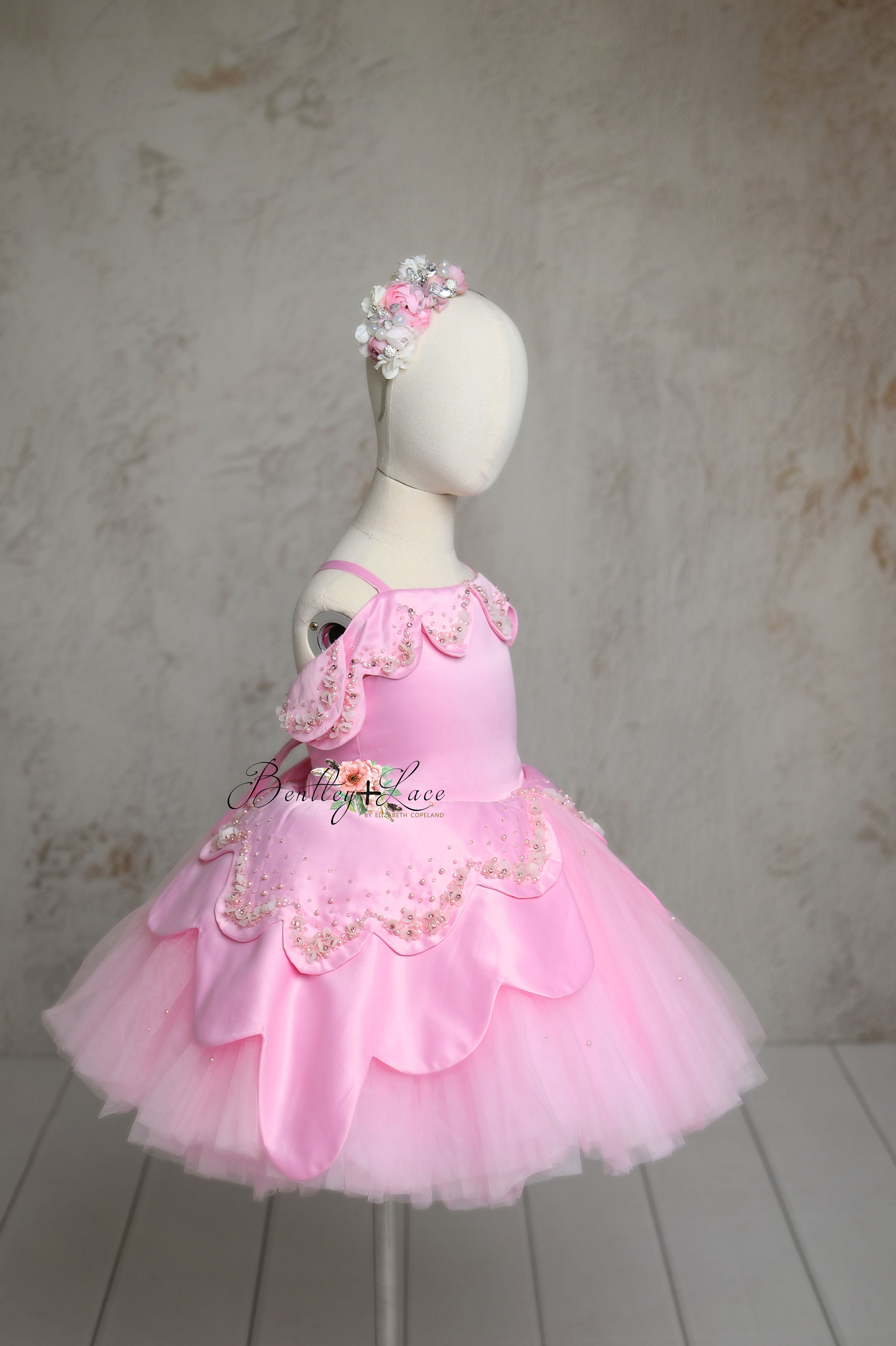 Full-length image of Ballerina Princess dress showing elegant satin fabric and elastic waist